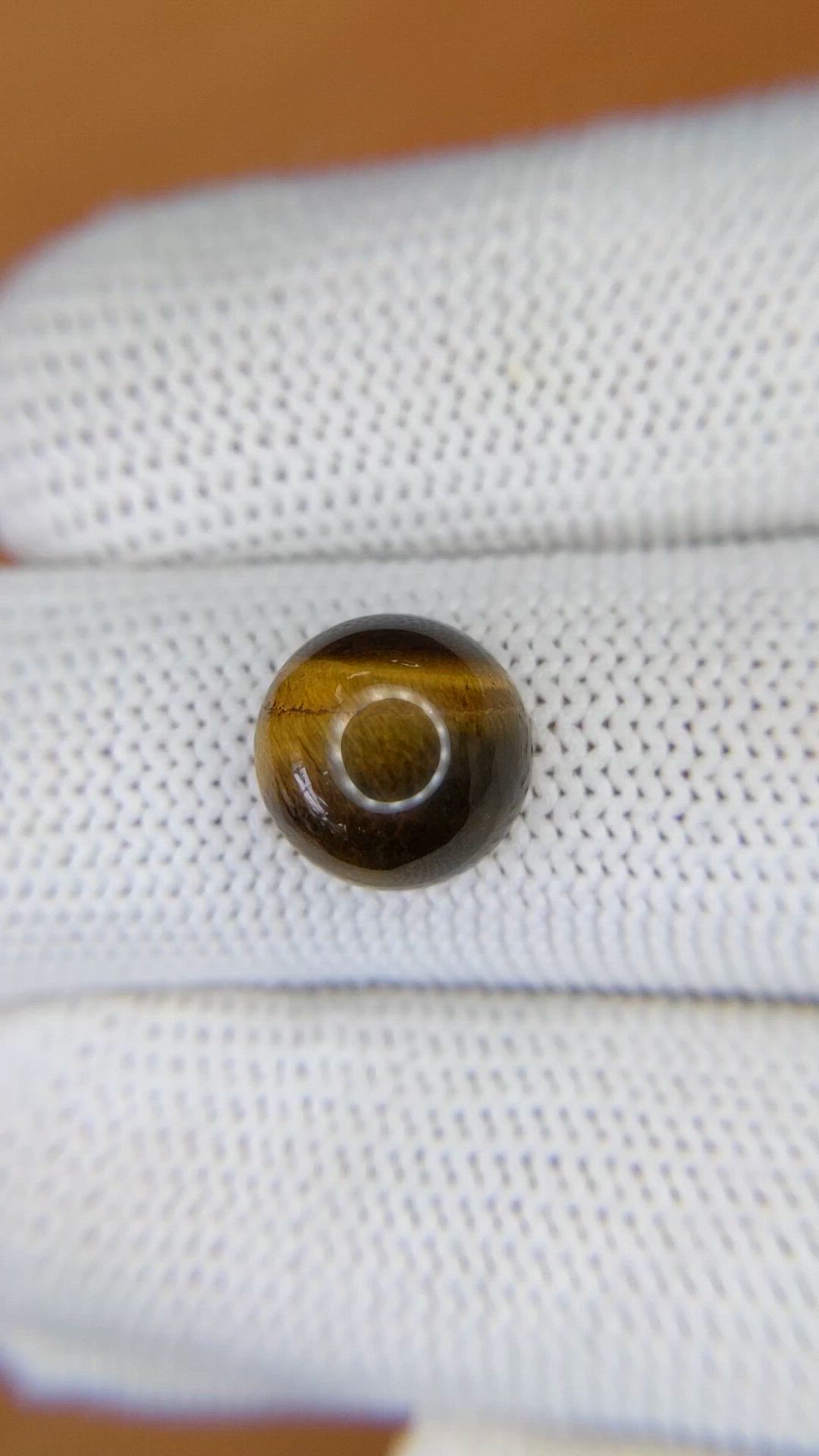 4.63 Ct. Cabochon Tiger's Eye from Ceylon (Sri Lanka) Size Video