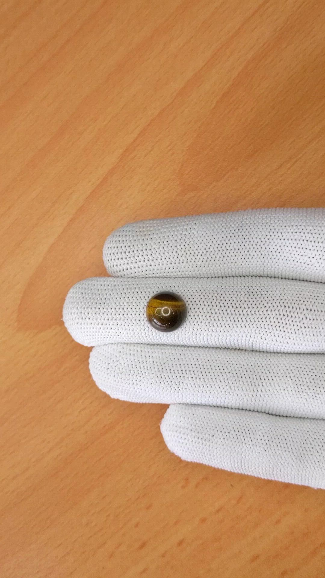 4.63 Ct. Cabochon Tiger's Eye from Ceylon (Sri Lanka) Size Video