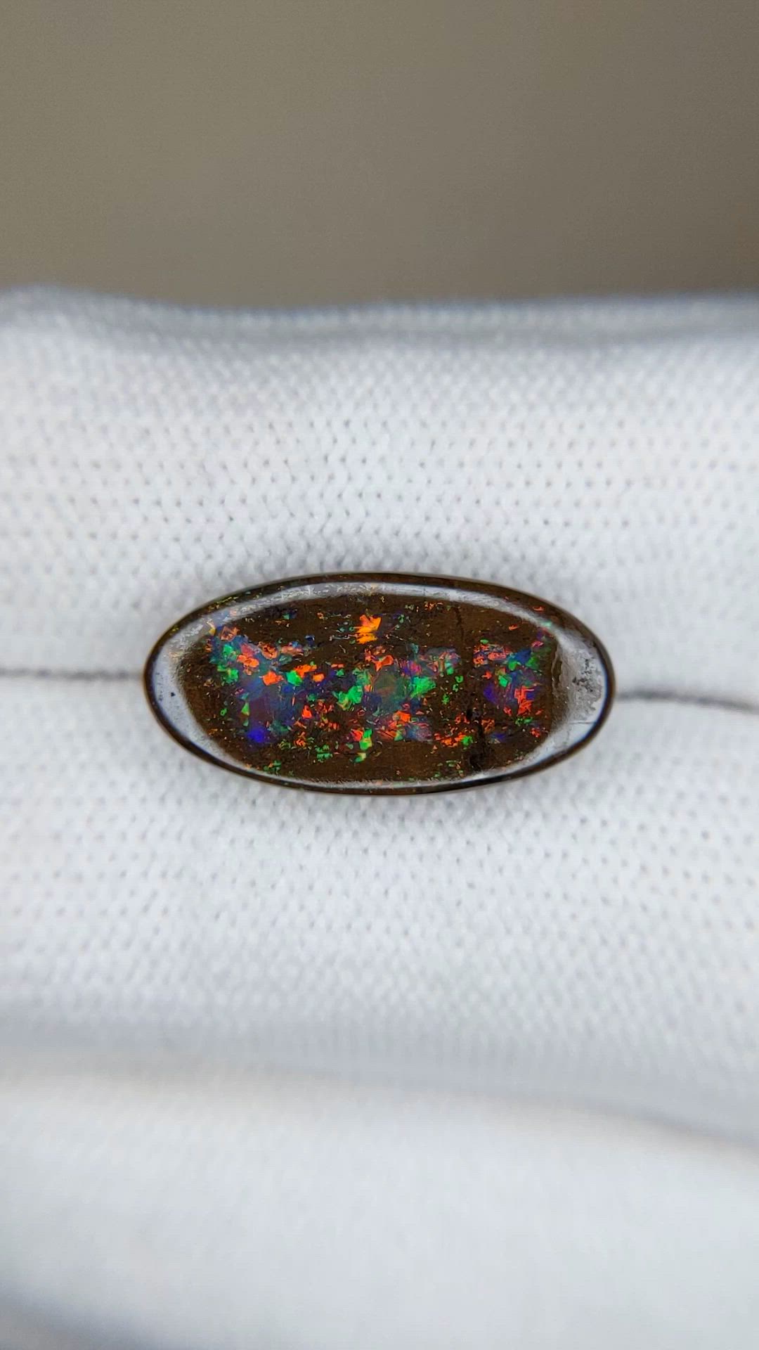 5.54 Ct. Multi Color Black Opal from Australia Size Video
