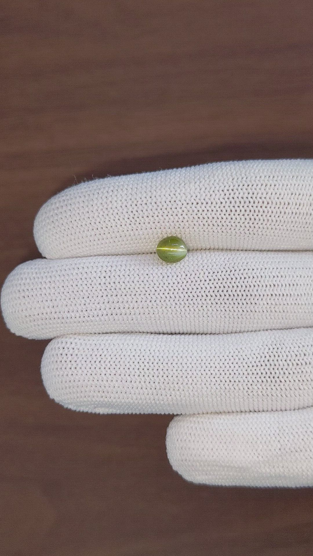 1.48 Ct. Yellowish Green Cabochon Chrysoberyl from Tanzania Size Video