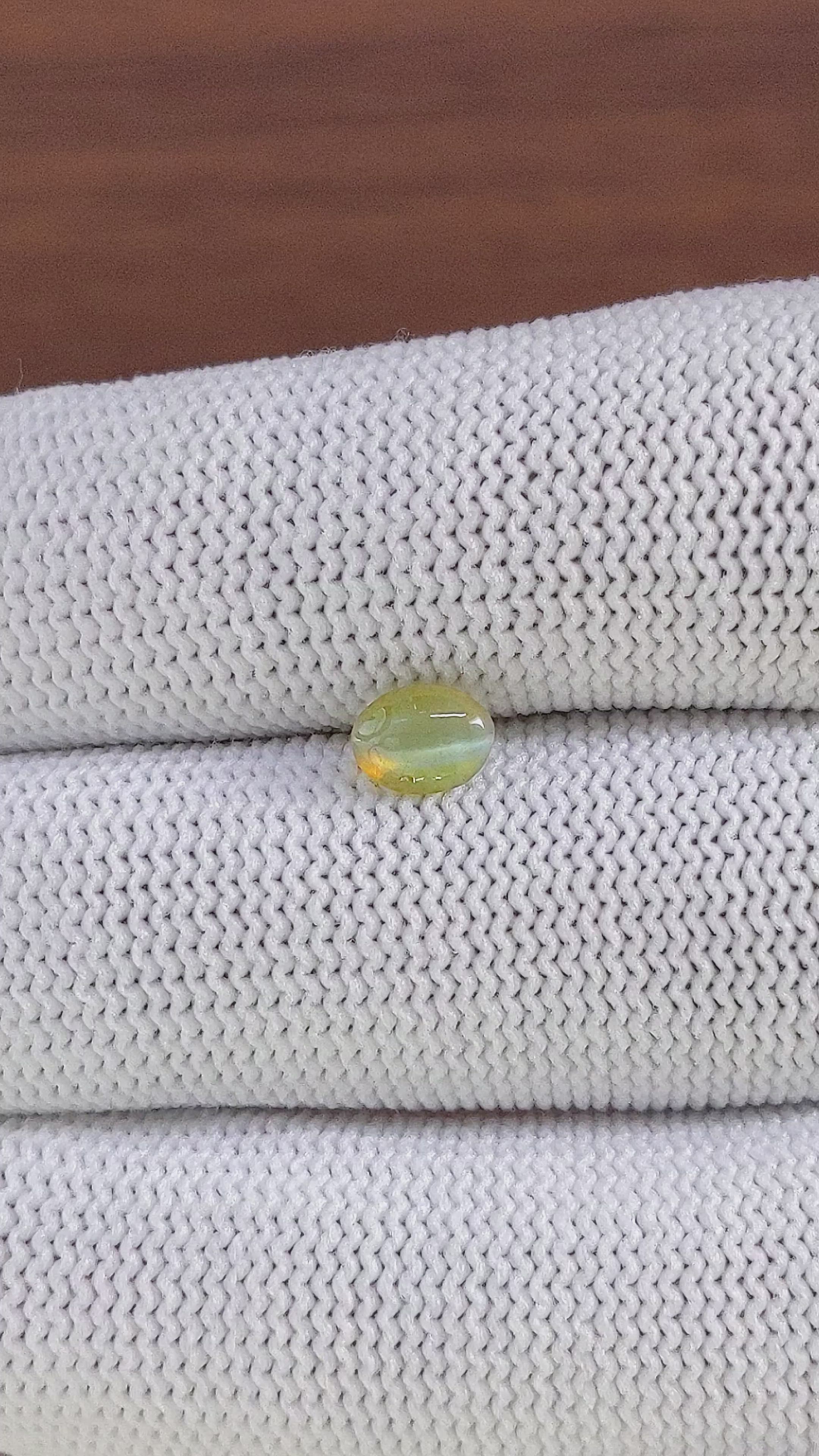 0.93 Ct. Yellowish Green Cabochon Chrysoberyl from Tanzania Size Video