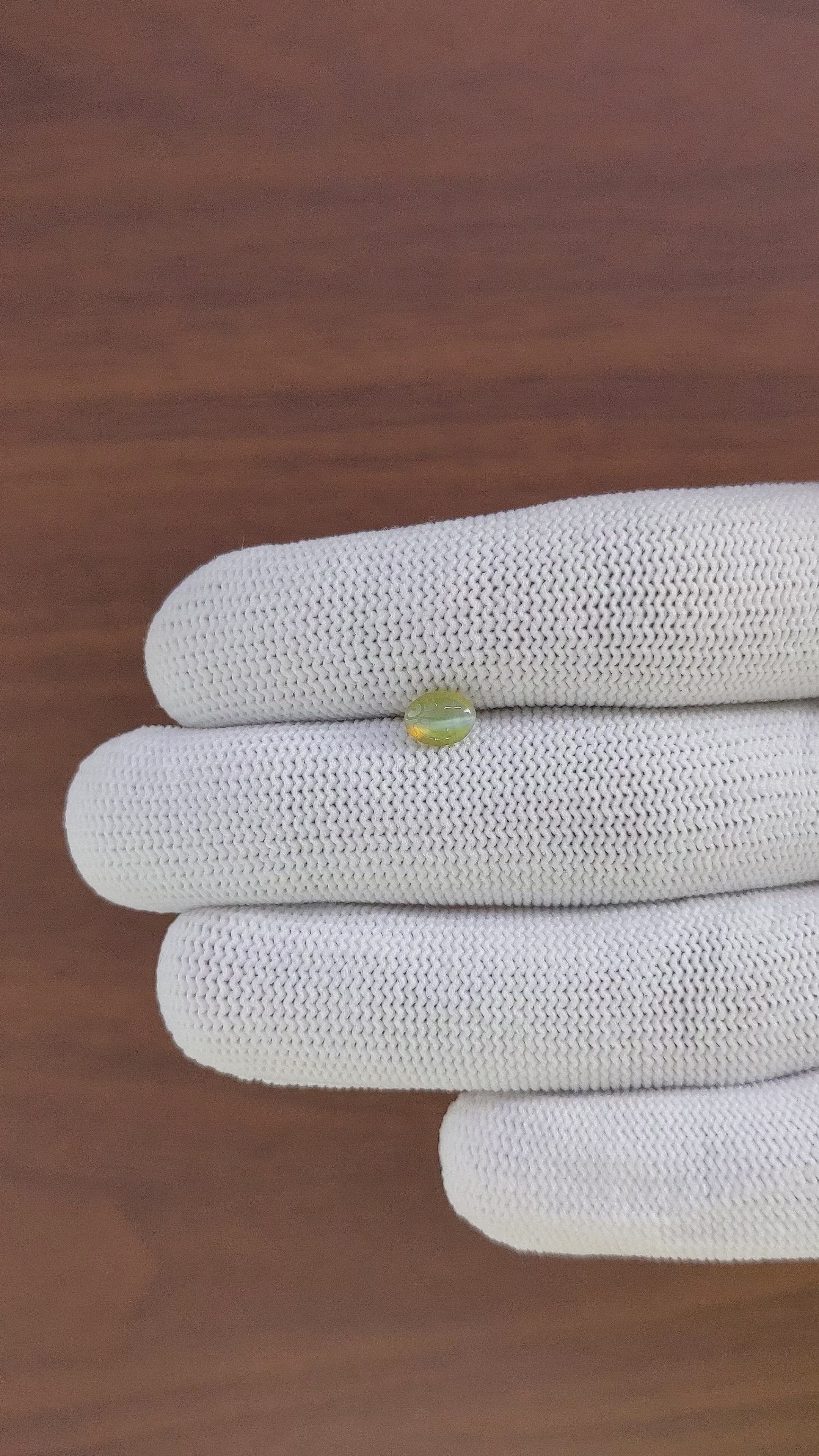 0.93 Ct. Yellowish Green Cabochon Chrysoberyl from Tanzania Size Video