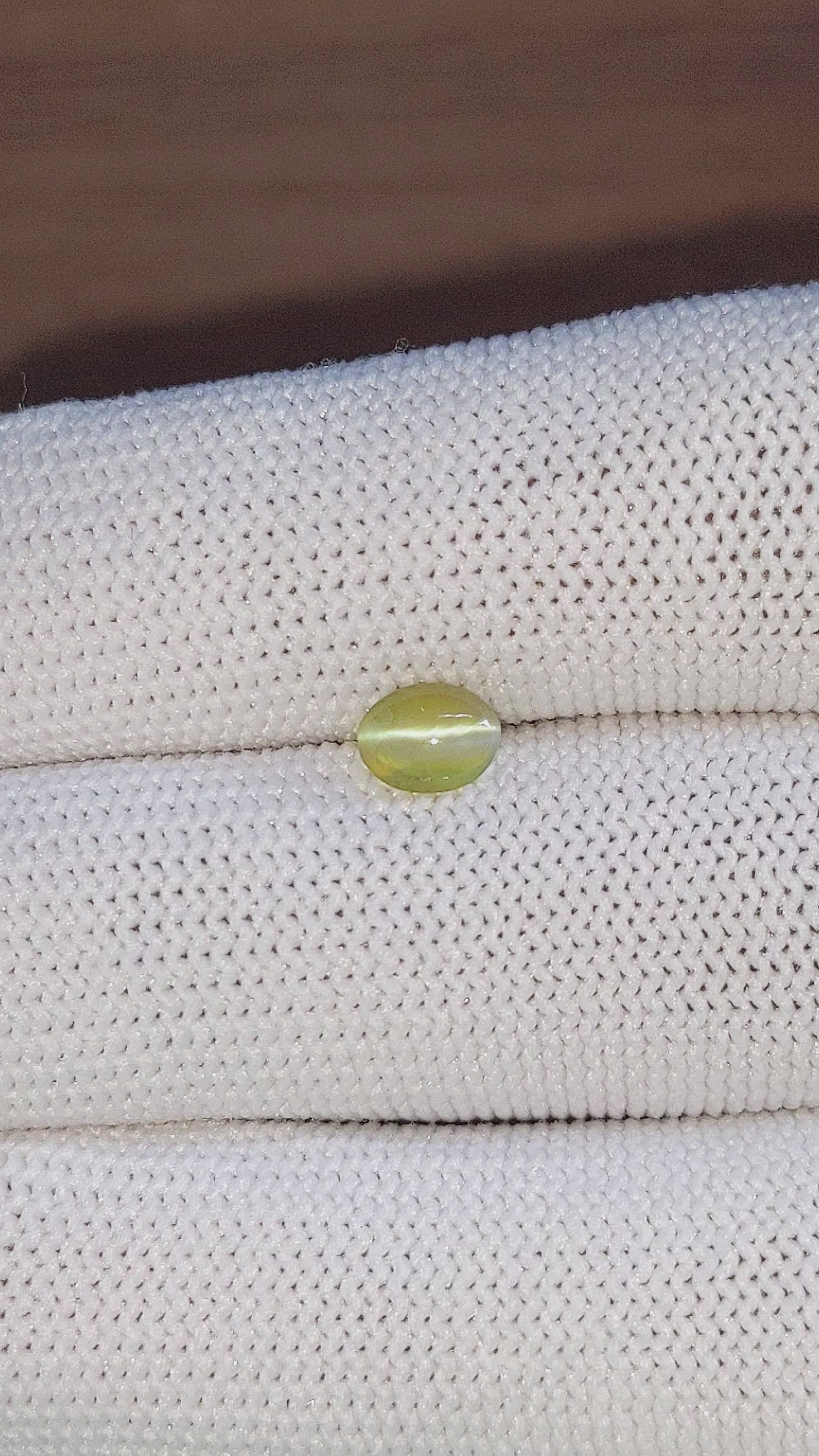 0.93 Ct. Yellowish Green Cabochon Chrysoberyl from Tanzania Size Video
