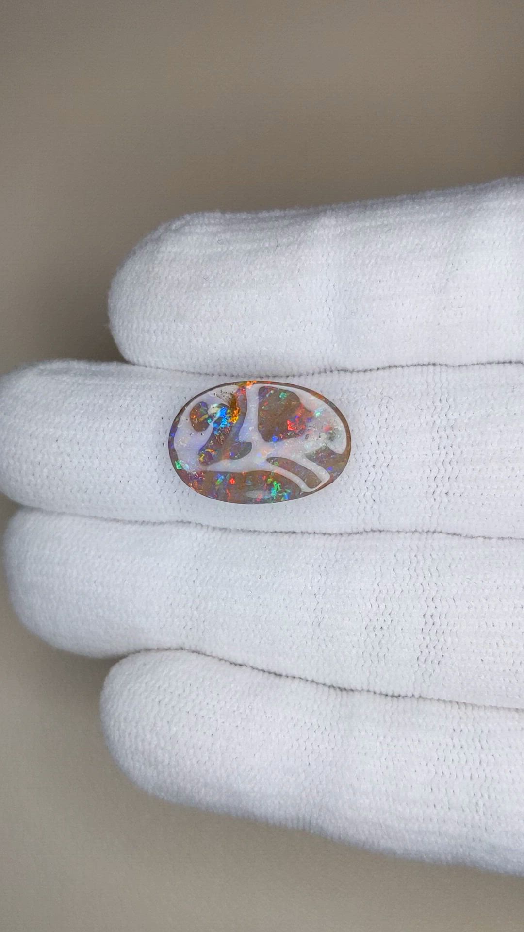 7.39 Ct. Multi Color Semi-Black Opal from Australia Size Video