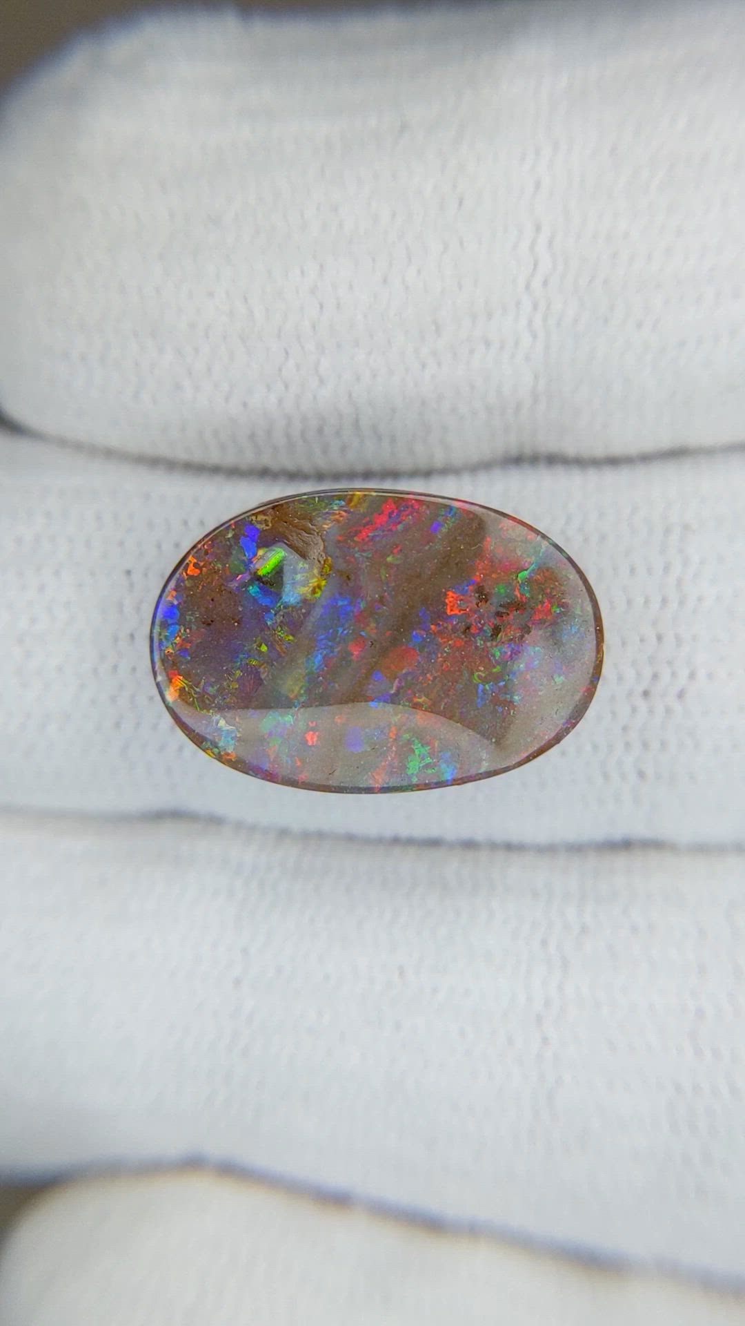 7.39 Ct. Multi Color Semi-Black Opal from Australia Size Video