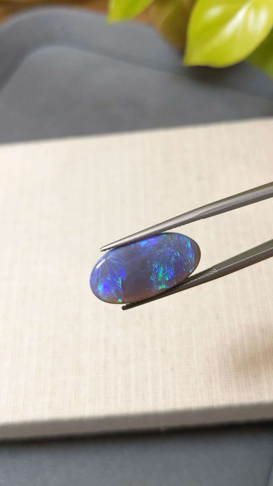 8.37 Ct. Multi Color Cabochon Black Opal from Australia Size Video
