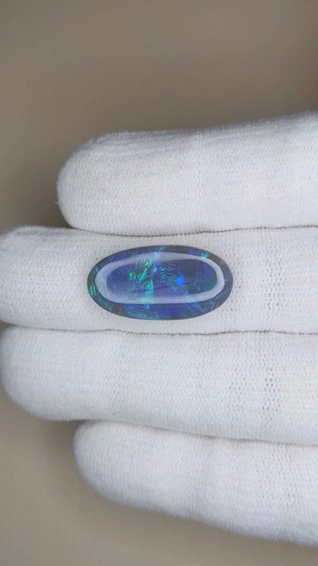 8.37 Ct. Multi Color Cabochon Black Opal from Australia Size Video