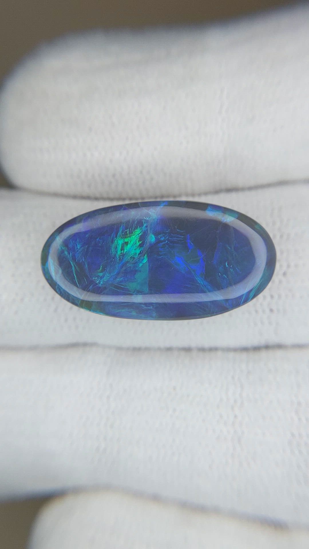 8.37 Ct. Multi Color Cabochon Black Opal from Australia Size Video