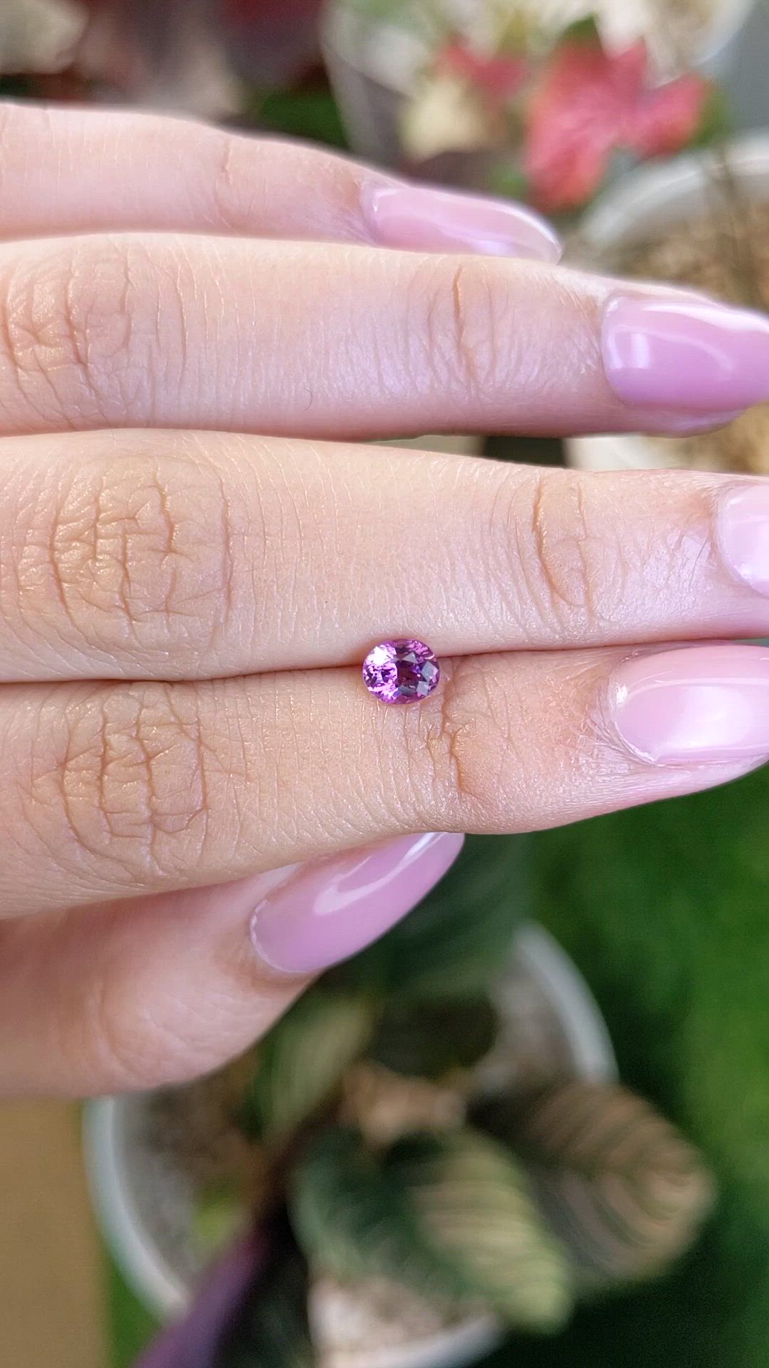 0.61 Ct. Pinkish Purple Rhodolite Garnet from Ceylon (Sri Lanka) Size Video