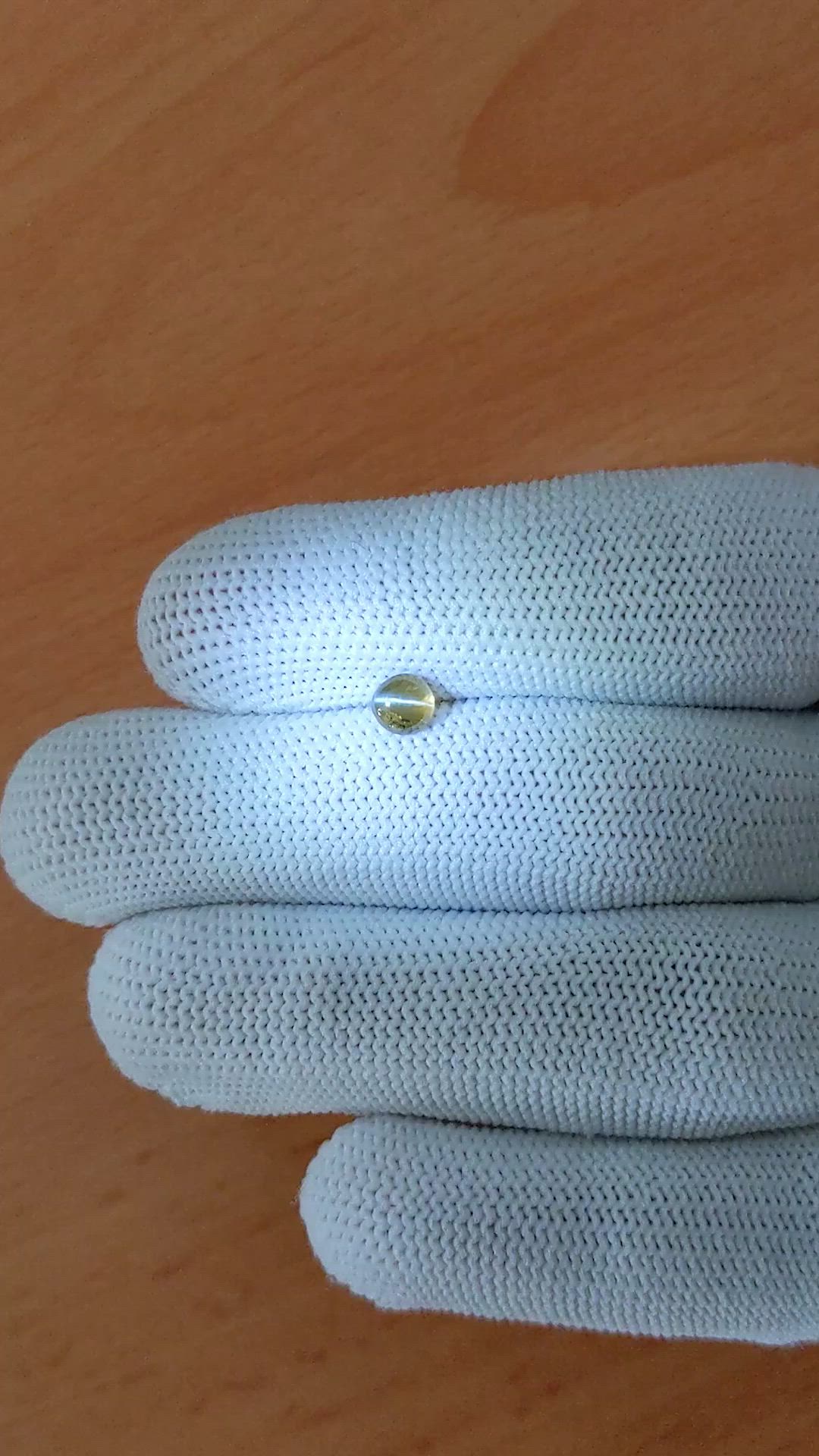 0.79 Ct. Yellowish Brown Cabochon Chrysoberyl from Ceylon (Sri Lanka) Size Video