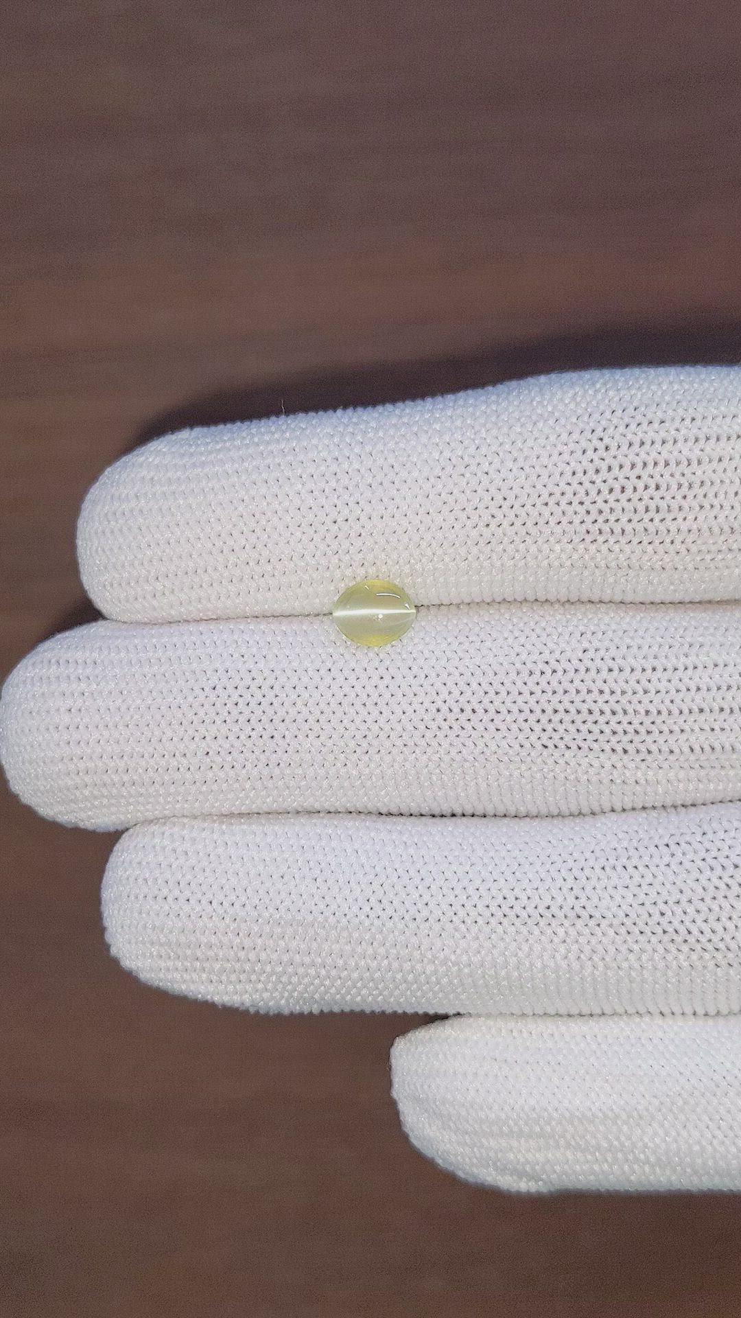 0.97 Ct. Greenish Yellow Cabochon Chrysoberyl from Tanzania Size Video