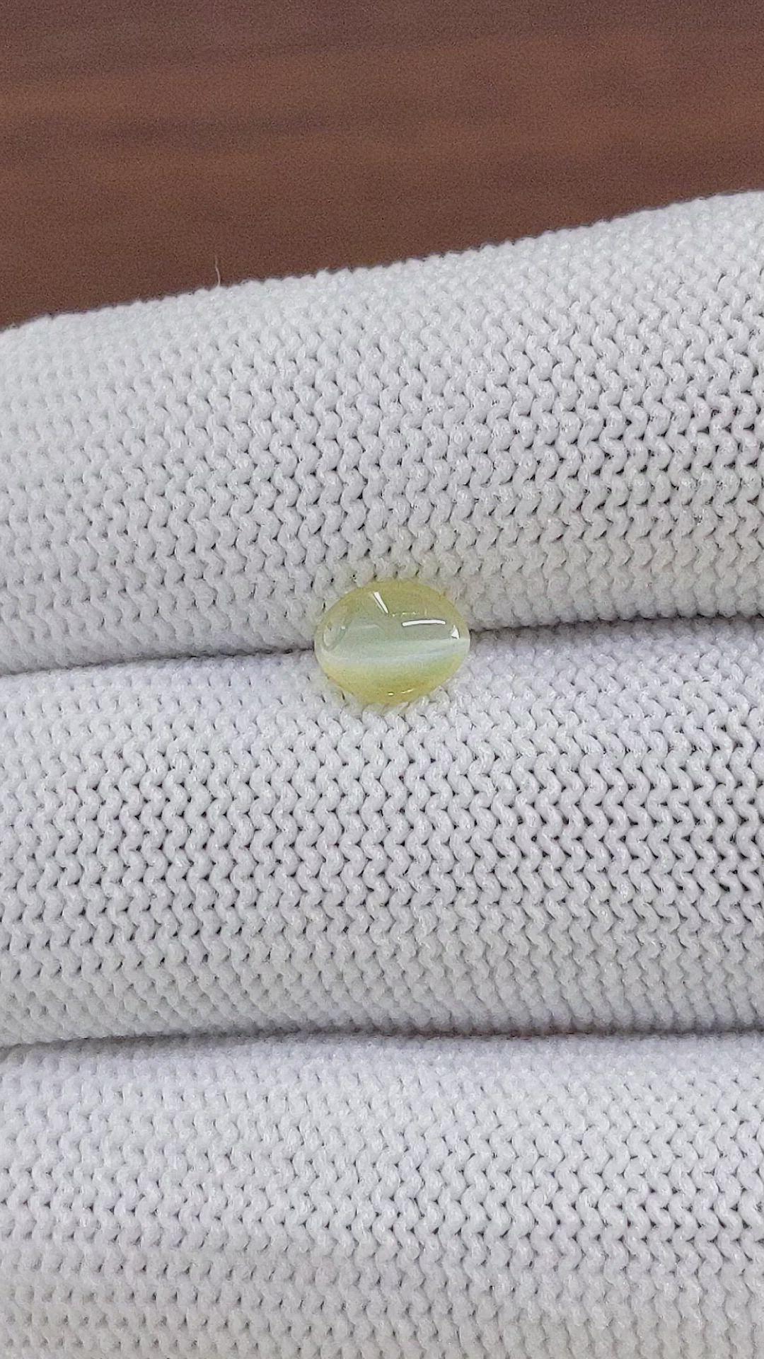 0.97 Ct. Greenish Yellow Cabochon Chrysoberyl from Tanzania Size Video