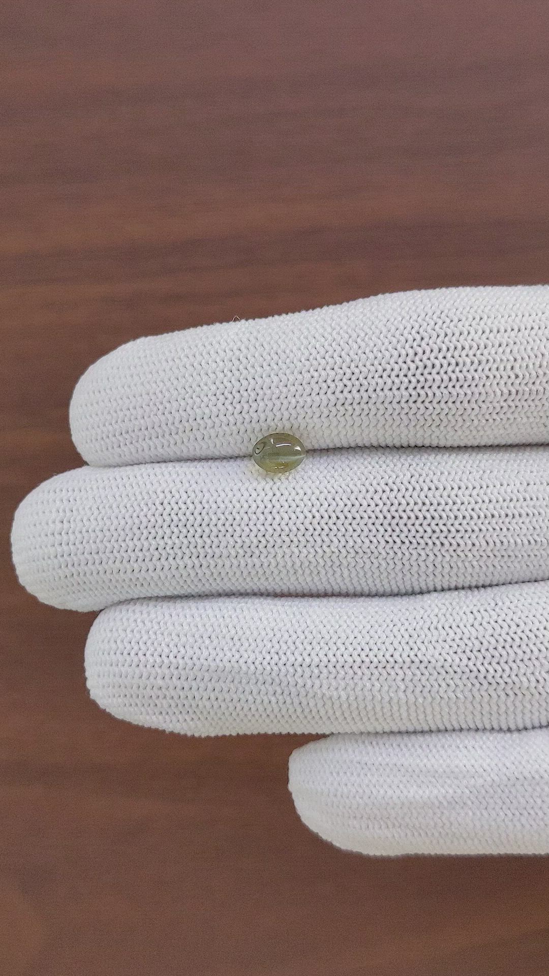 1.09 Ct. Brownish Green Cabochon Chrysoberyl from Tanzania Size Video