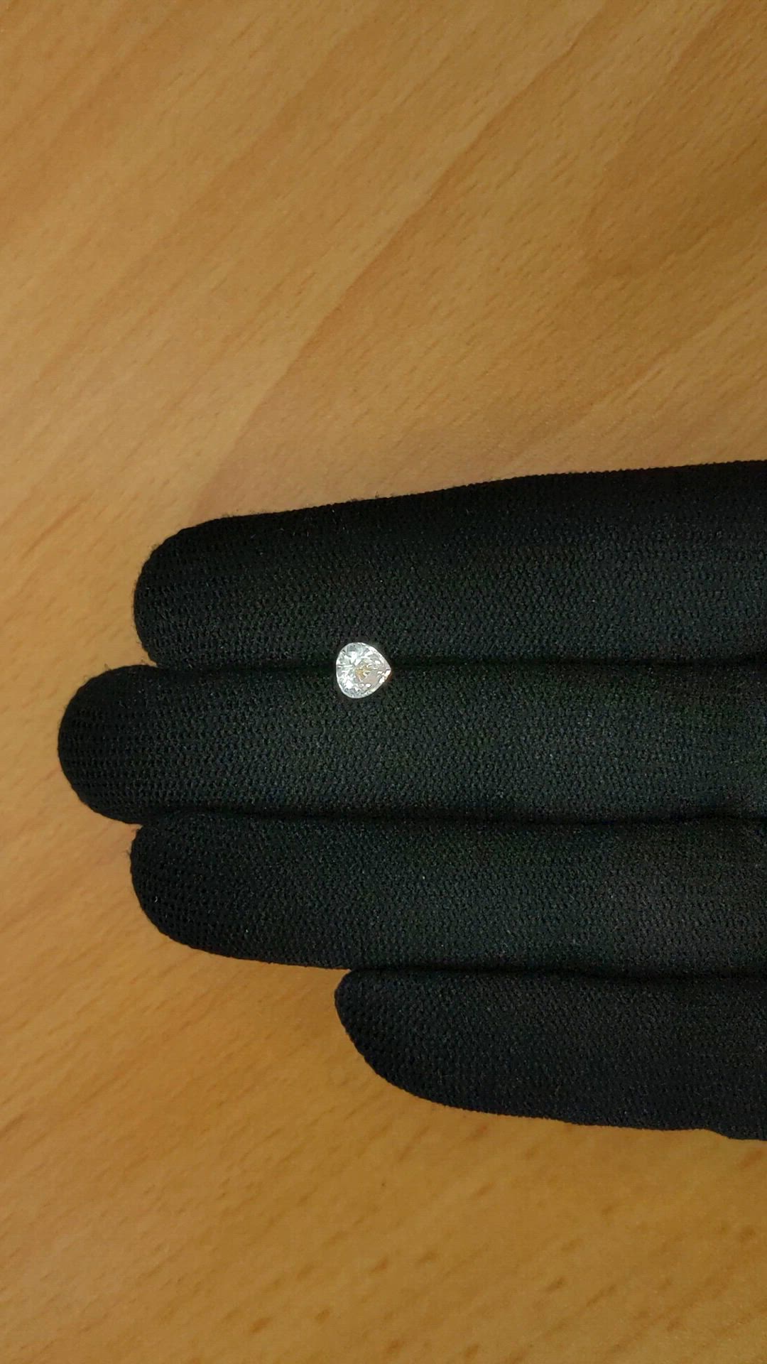 0.65 Ct. Rainbow Moonstone from Ceylon (Sri Lanka) Size Video