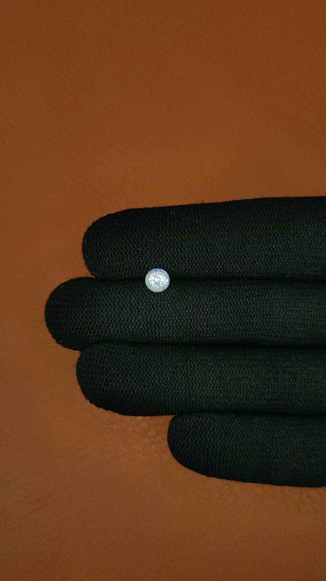 0.61 Ct. Rainbow Moonstone from Ceylon (Sri Lanka) Size Video