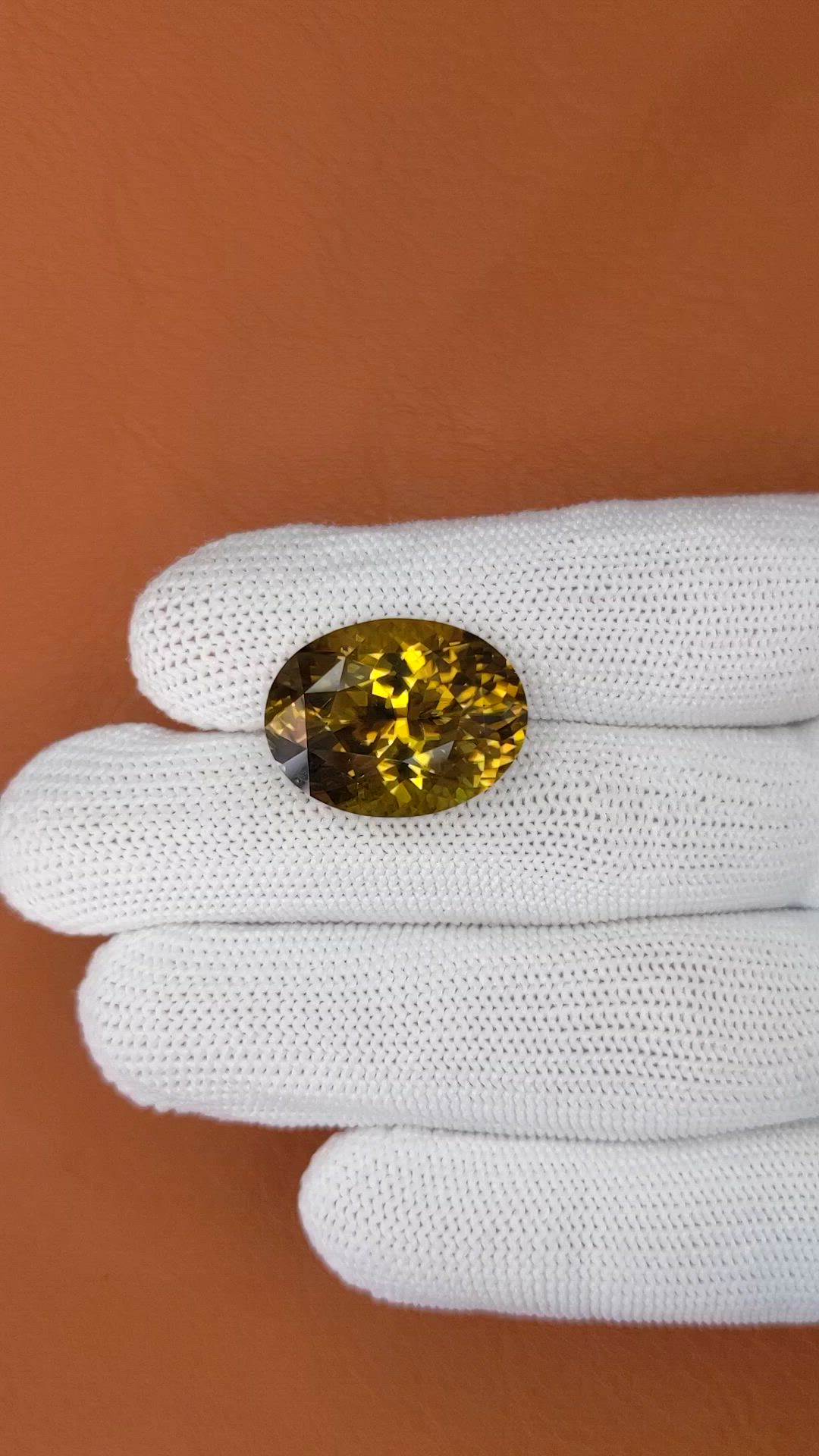 20.89 Ct. Golden Brown Sinhalite from Ceylon (Sri Lanka) Size Video