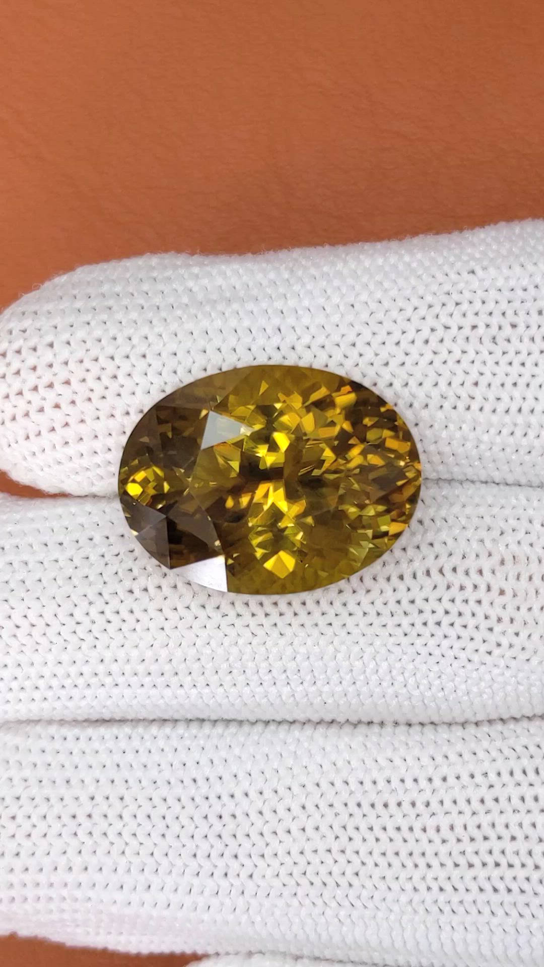 20.89 Ct. Golden Brown Sinhalite from Ceylon (Sri Lanka) Size Video