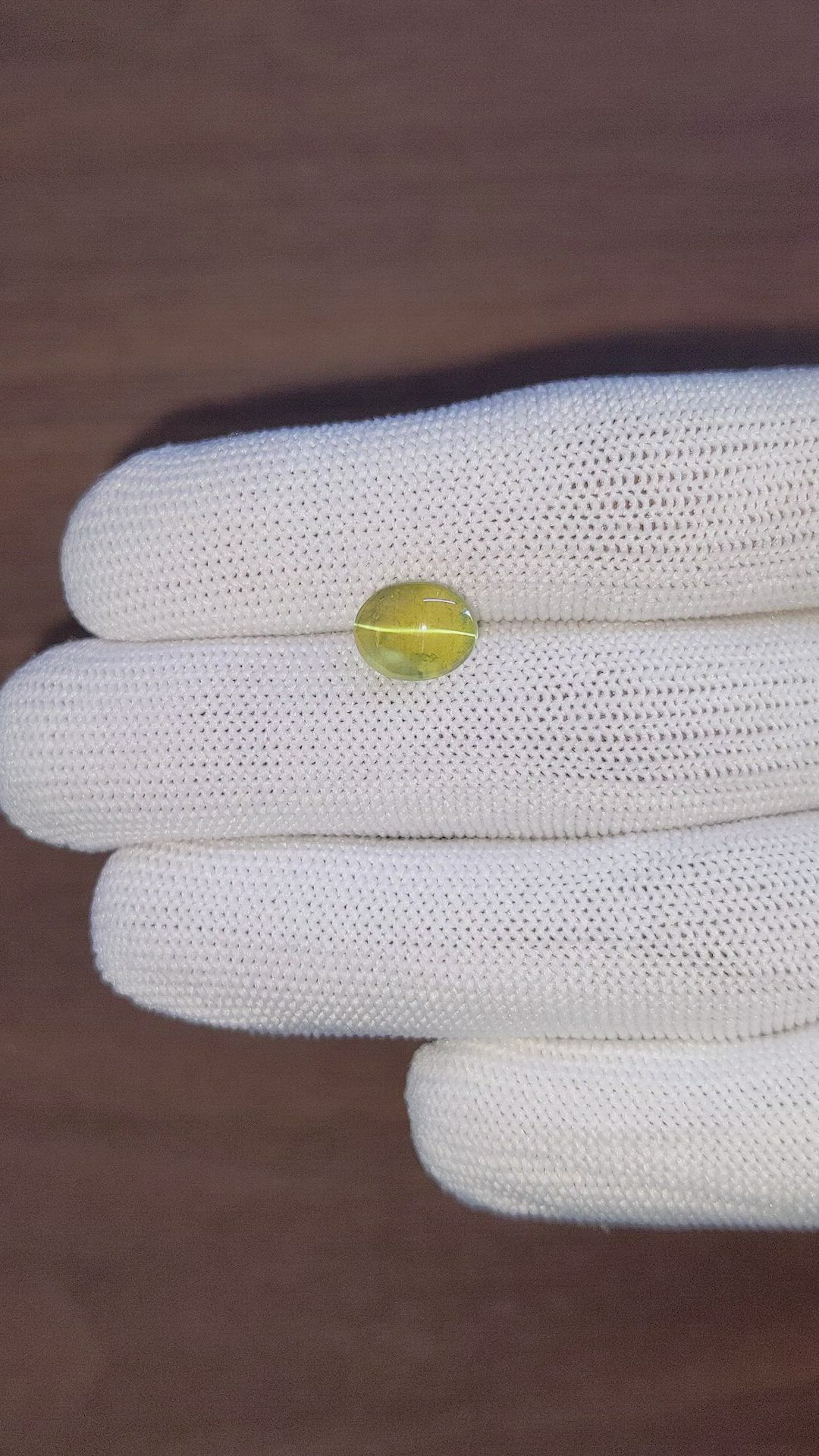 4.24 Ct. Yellowish Green Cabochon Chrysoberyl from Ceylon (Sri Lanka) Size Video