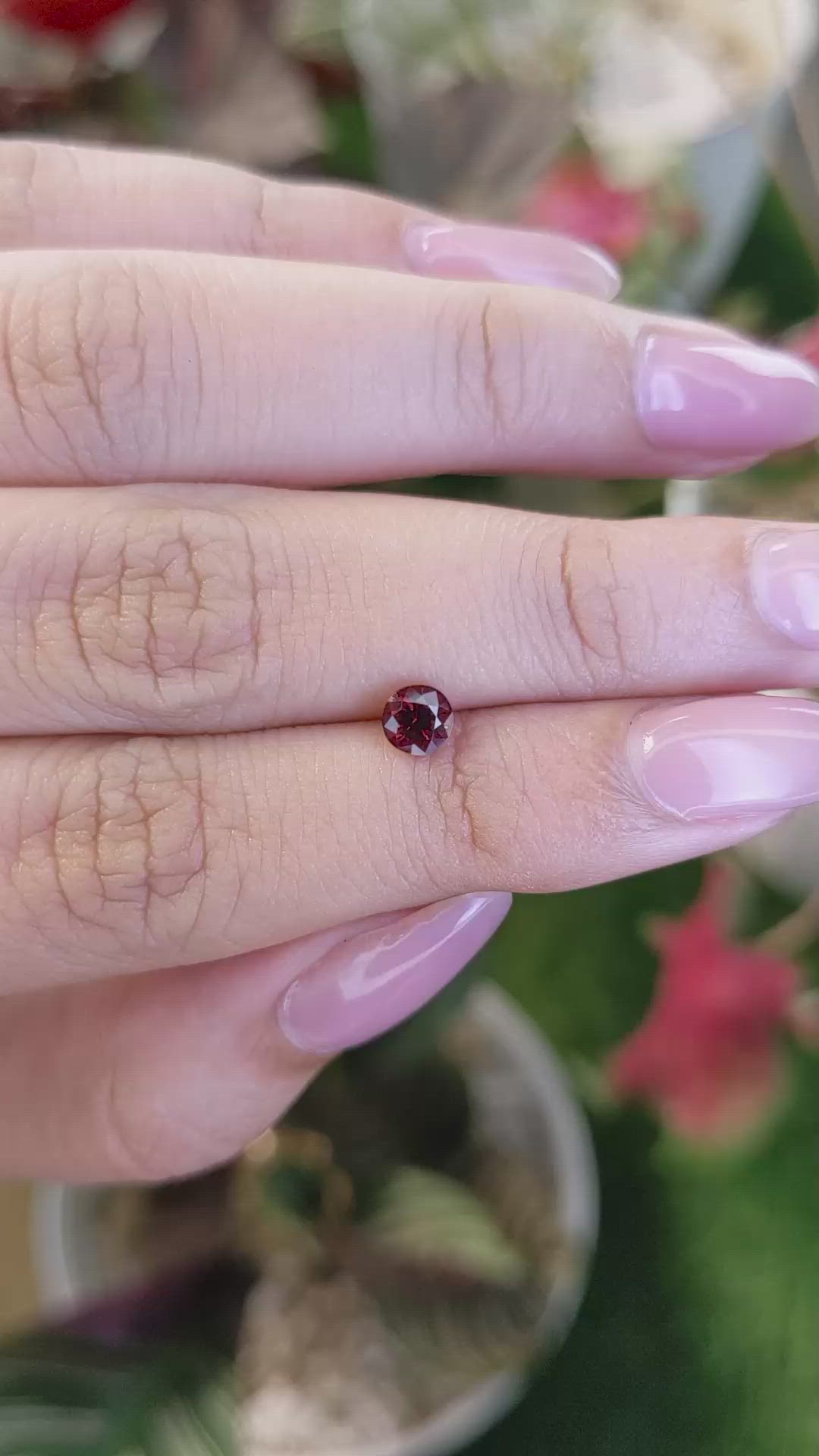 0.61 Ct. Red Rhodolite Garnet from Ceylon (Sri Lanka) Size Video