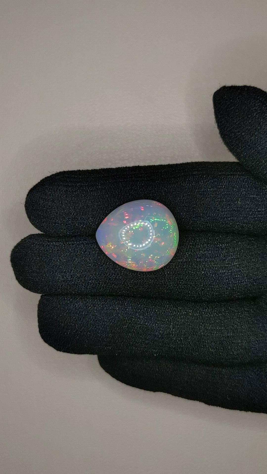 8.73 Ct. Multi Color Cabochon White Opal from Ethiopia Size Video
