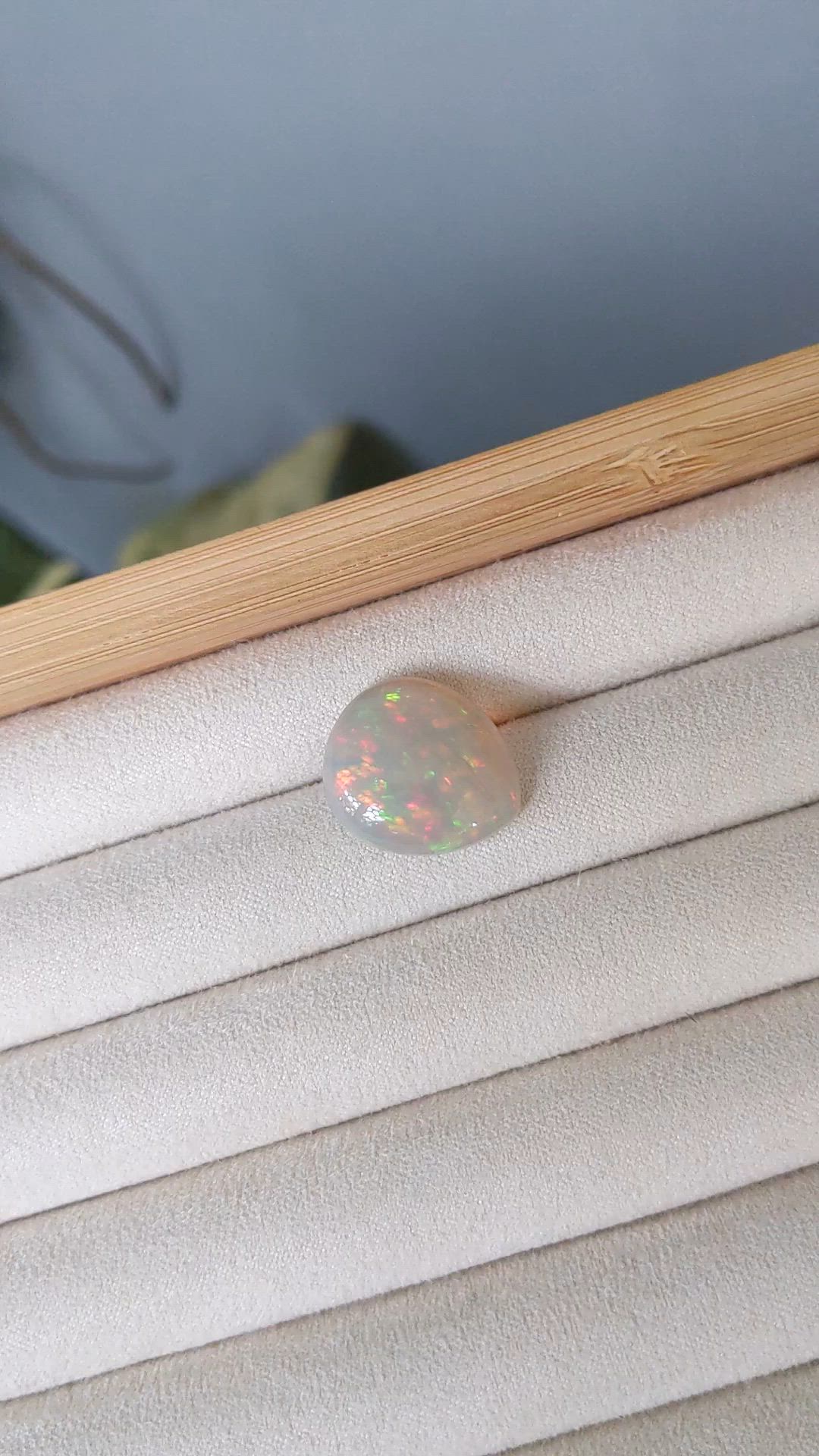 8.73 Ct. Multi Color Cabochon White Opal from Ethiopia Size Video