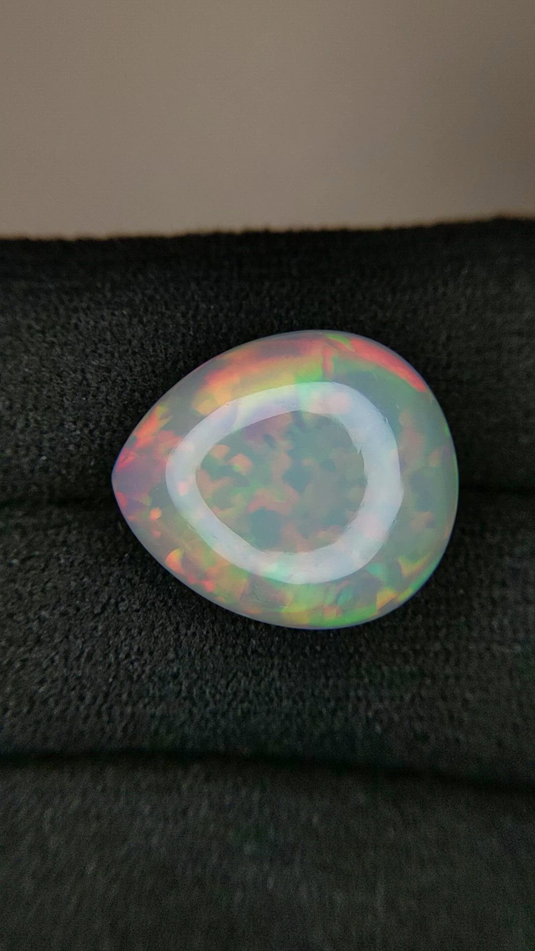 8.73 Ct. Multi Color Cabochon White Opal from Ethiopia Size Video