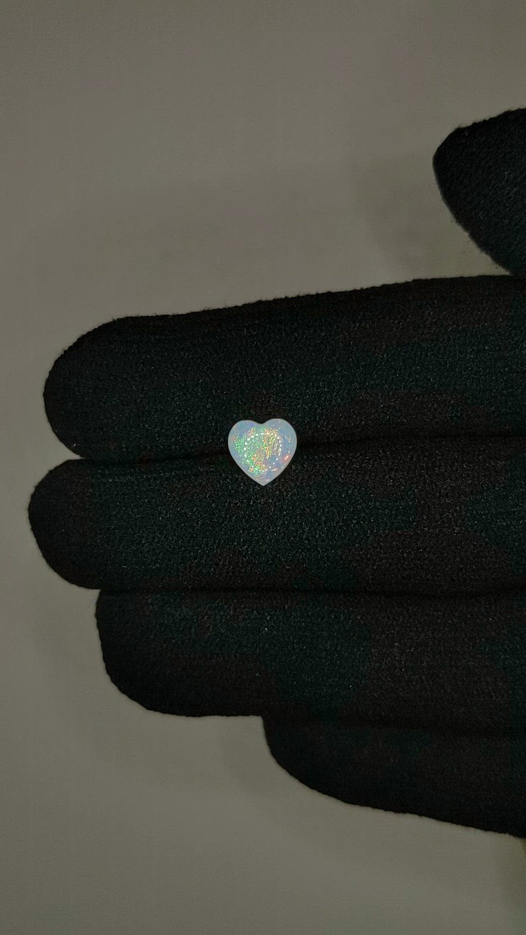 0.52 Ct. Multi Color Cabochon White Opal from Ethiopia Size Video