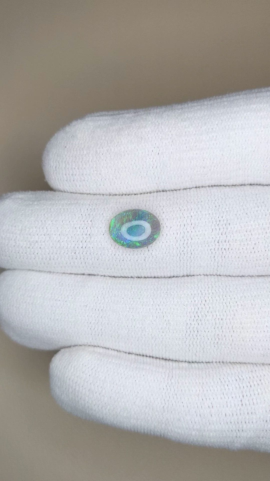1.22 Ct. Multi Color Cabochon Black Opal from Ethiopia Size Video