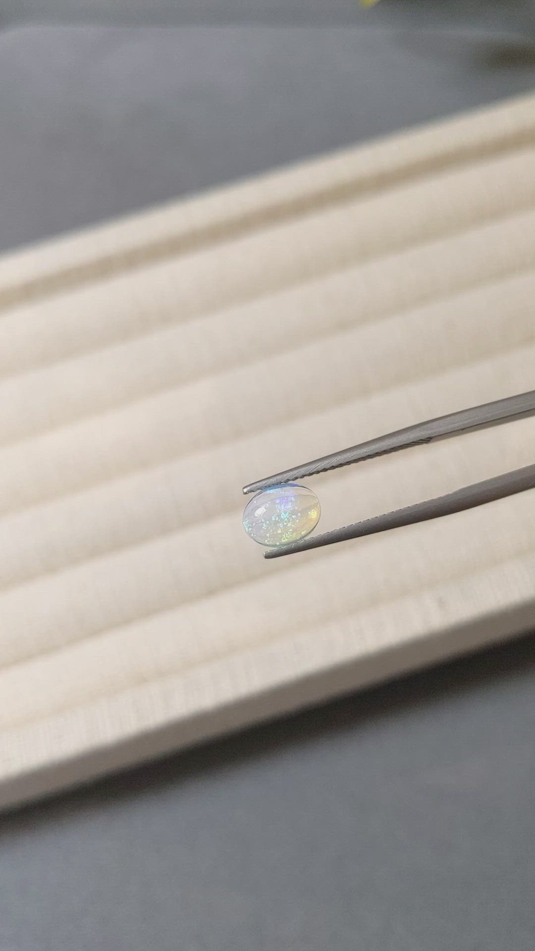 0.77 Ct. Multi Color Cabochon White Opal (Light Opal) from Ethiopia Size Video