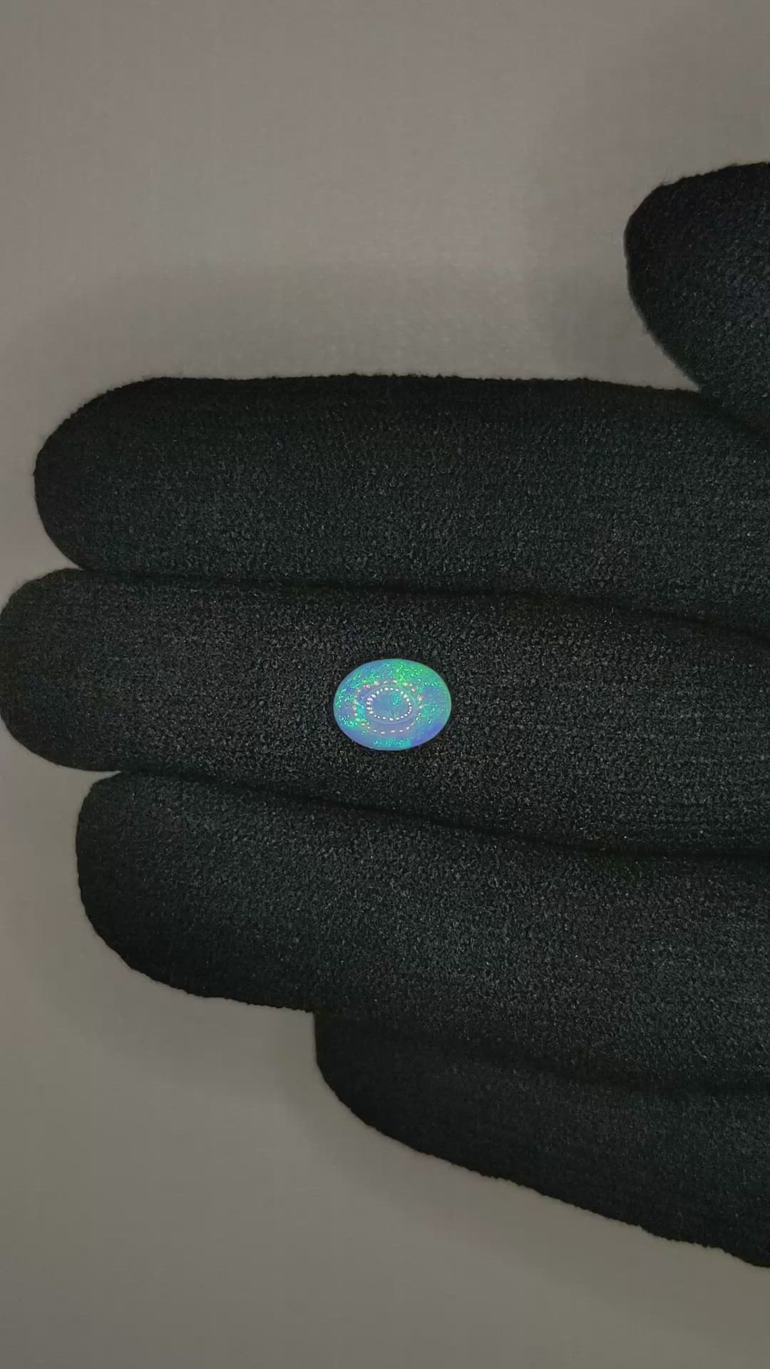 0.77 Ct. Multi Color Cabochon White Opal from Ethiopia Size Video