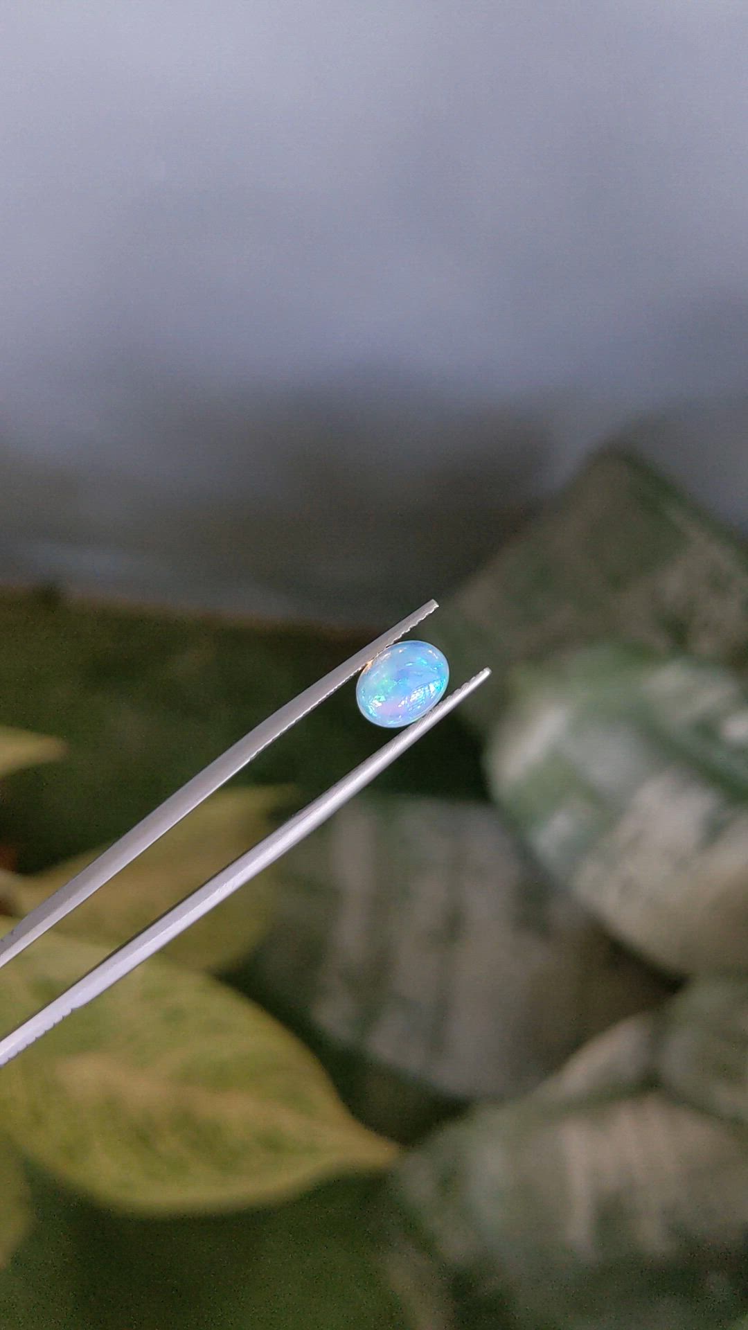 1.02 Ct. Multi Color Cabochon White Opal from Ethiopia Size Video