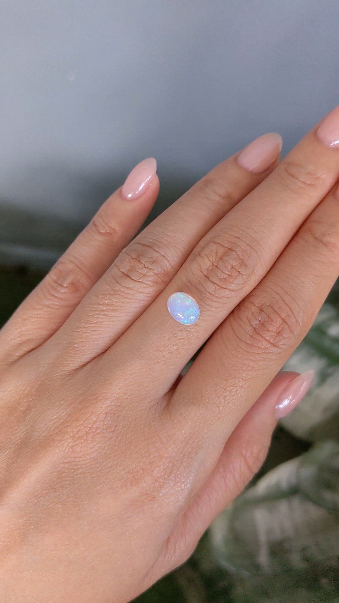 1.02 Ct. Multi Color Cabochon White Opal from Ethiopia Size Video
