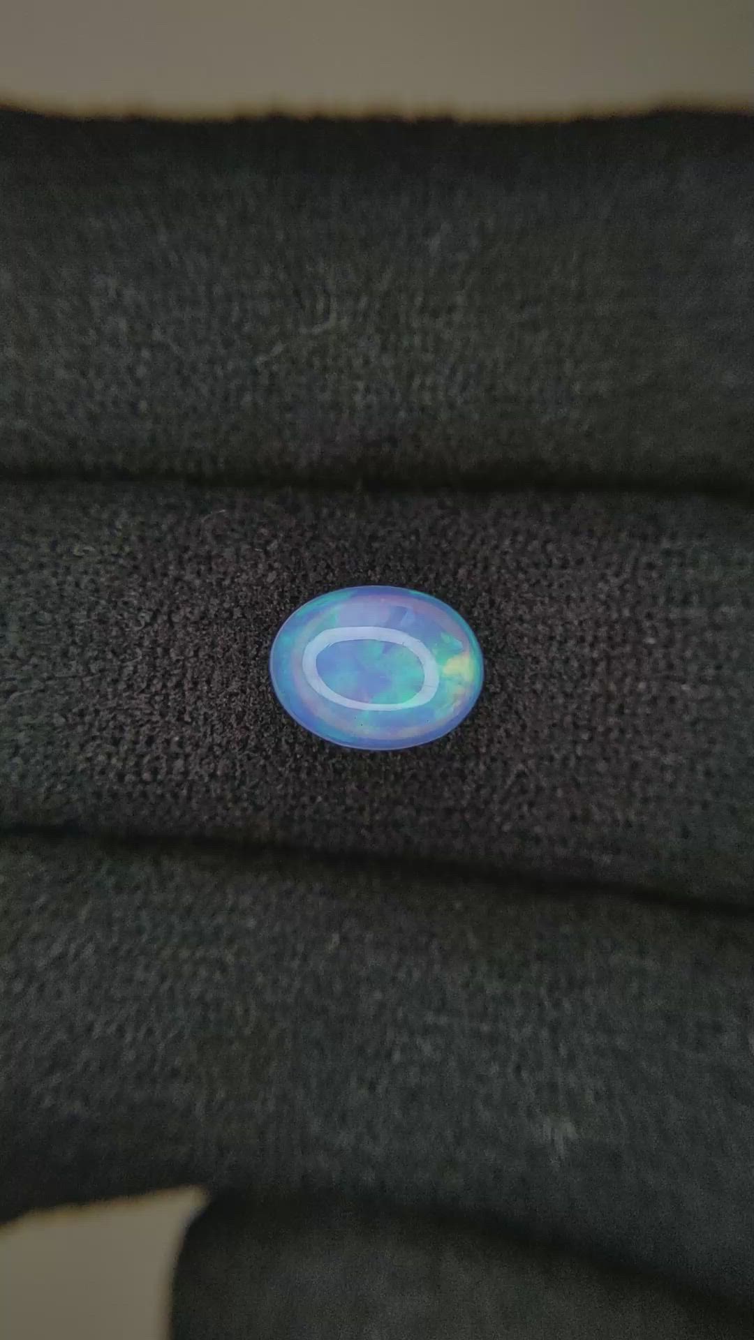 1.02 Ct. Multi Color Cabochon White Opal from Ethiopia Size Video