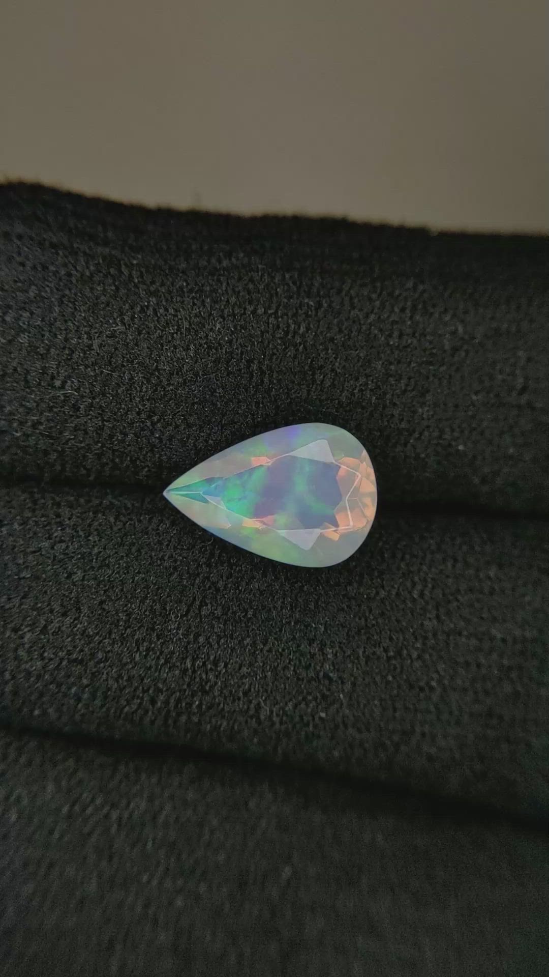 1.57 Ct. Multi Color White Opal from Ethiopia Size Video