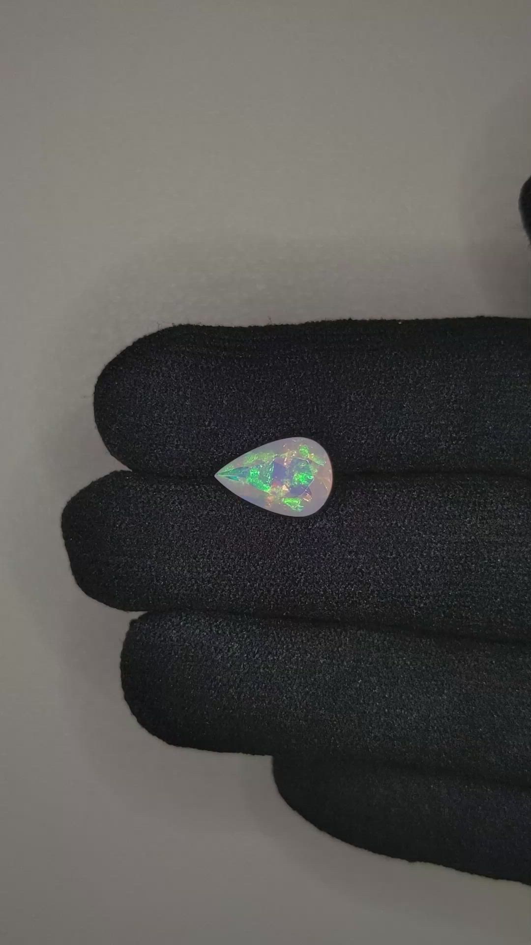 1.57 Ct. Multi Color White Opal from Ethiopia Size Video