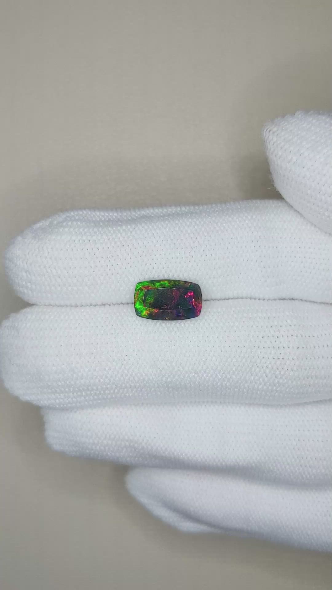 1.36 Ct. Multi Color Black Opal from Ethiopia Size Video