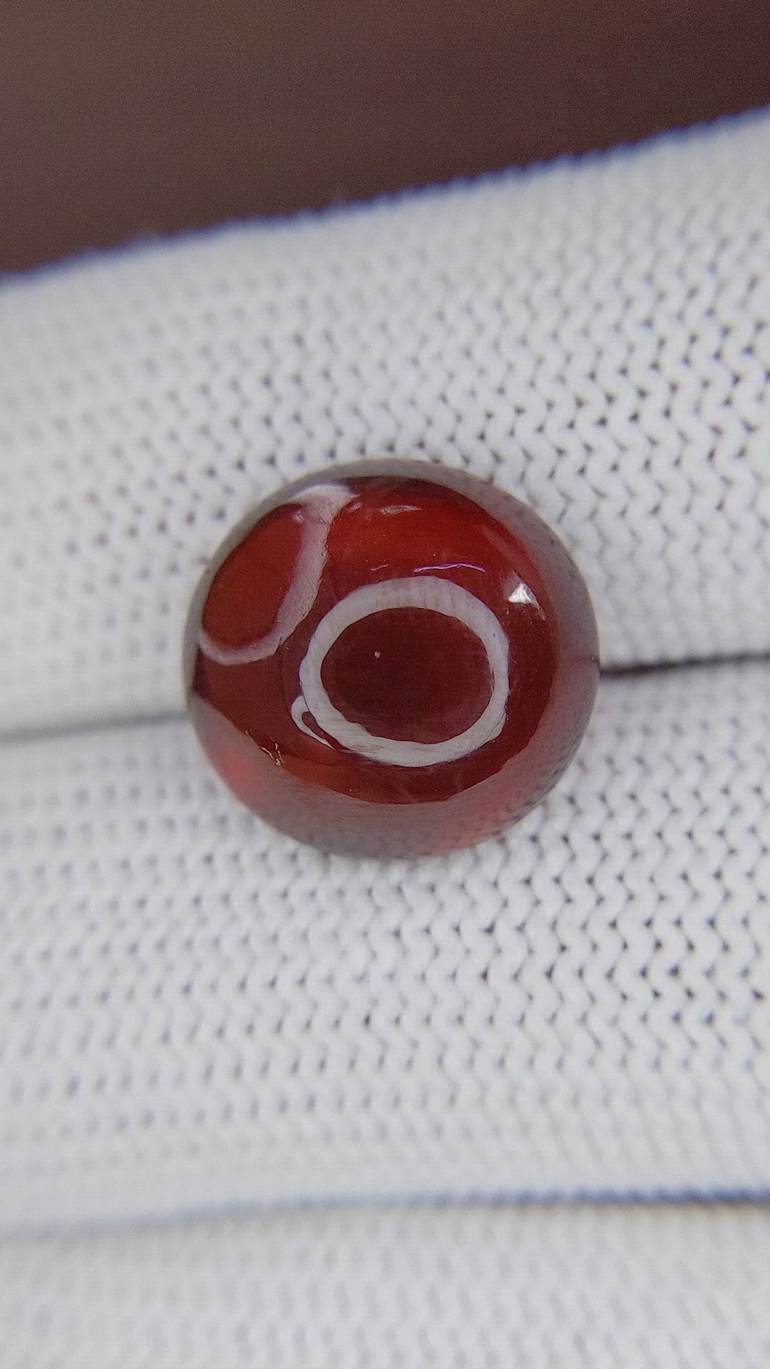 11.44 Ct. Red Cabochon Hessonite Garnet Size Video