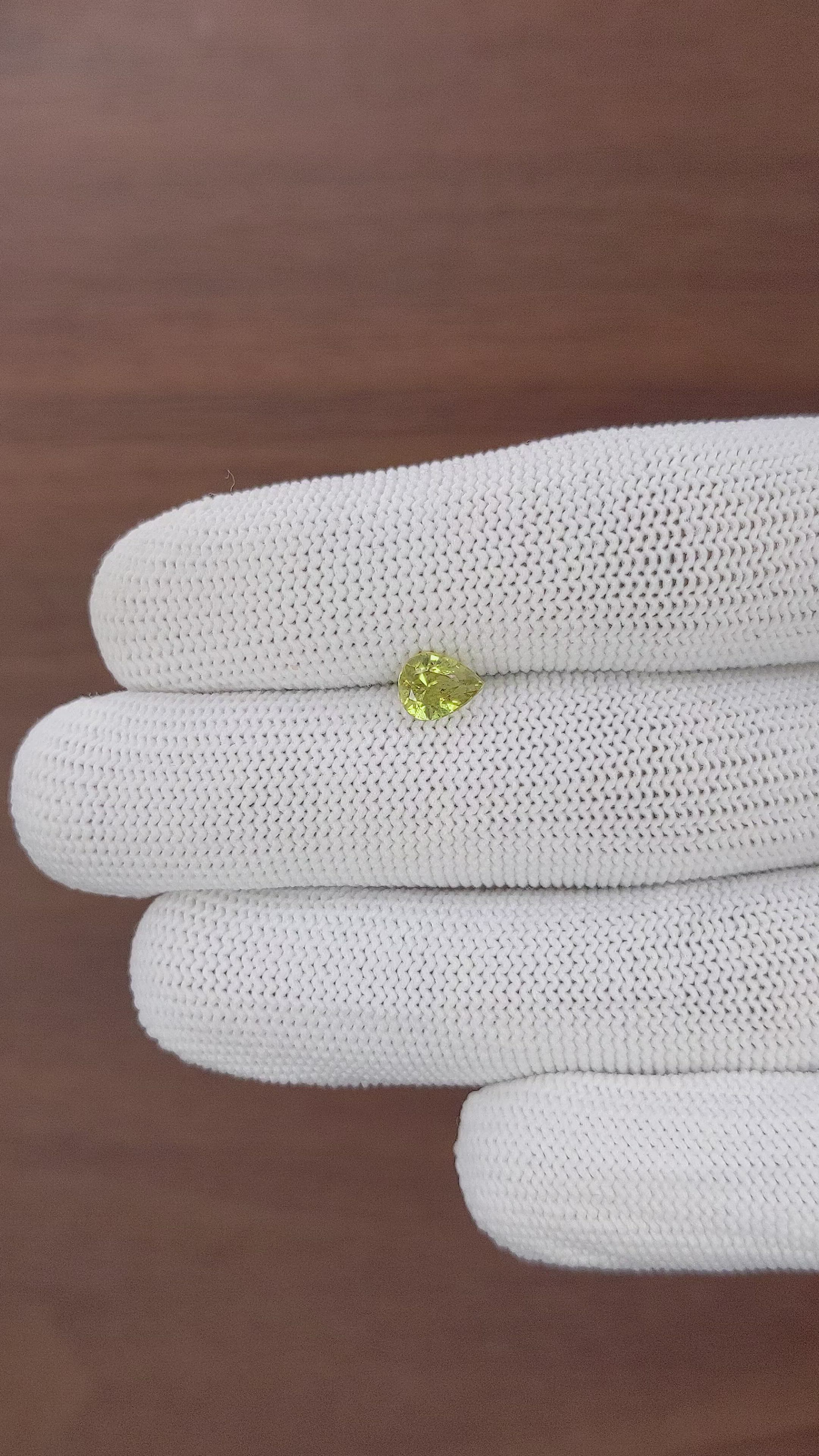 0.90 Ct. Brownish Green Chrysoberyl from Tanzania Size Video