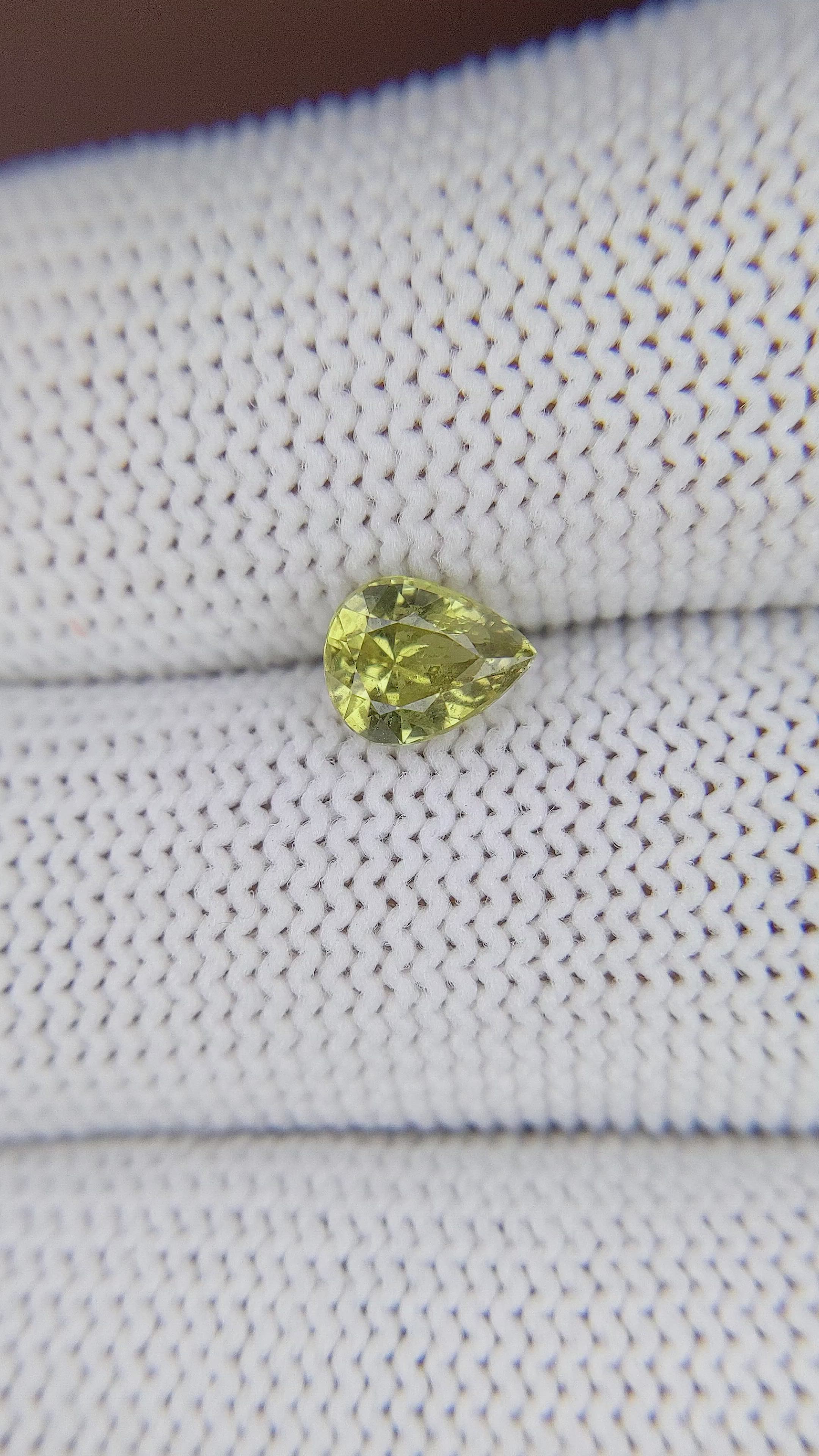 0.90 Ct. Brownish Green Chrysoberyl from Tanzania Size Video