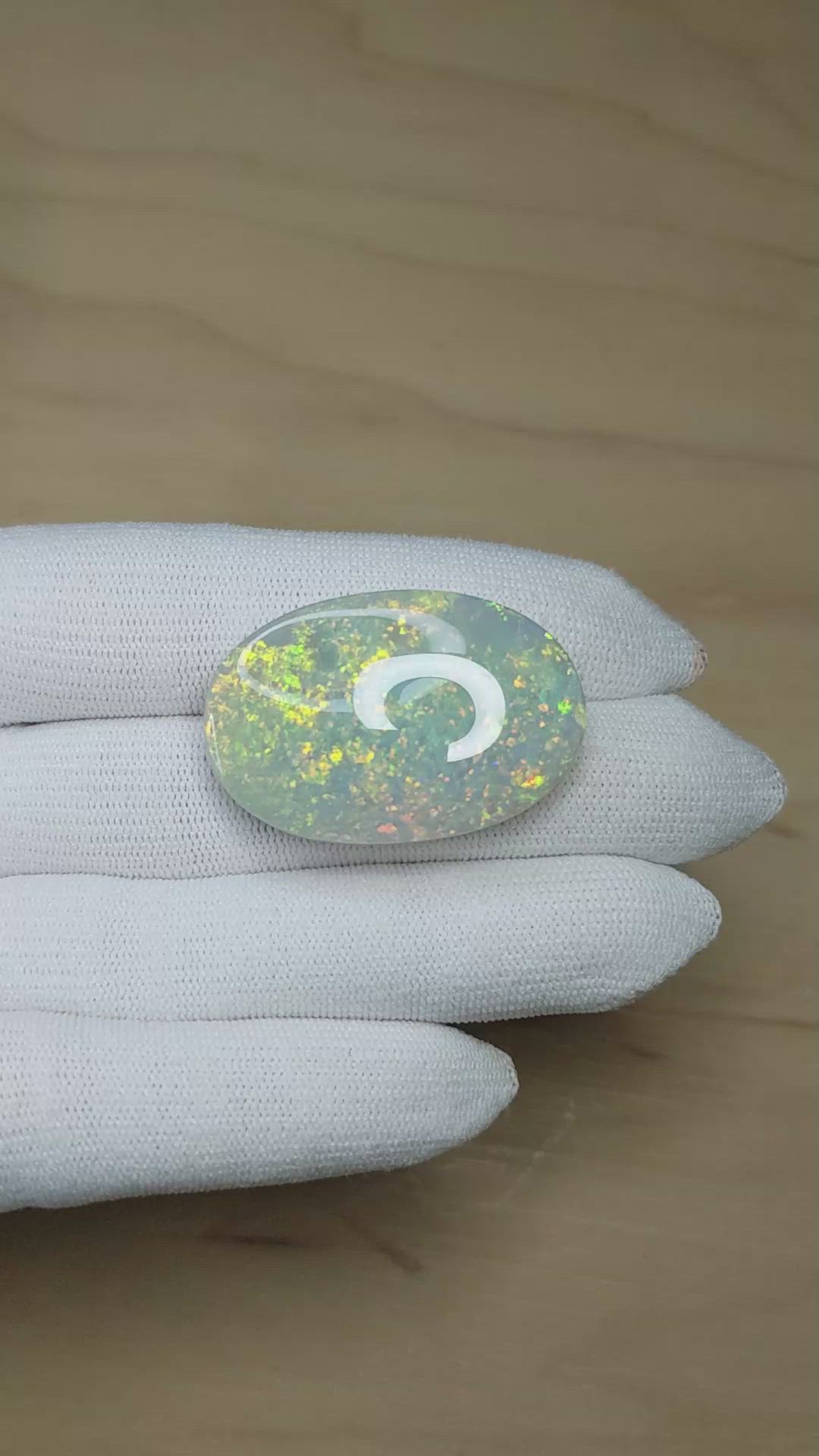 48.40 Ct. Multi Color Cabochon Semi-Black Opal from Australia Size Video