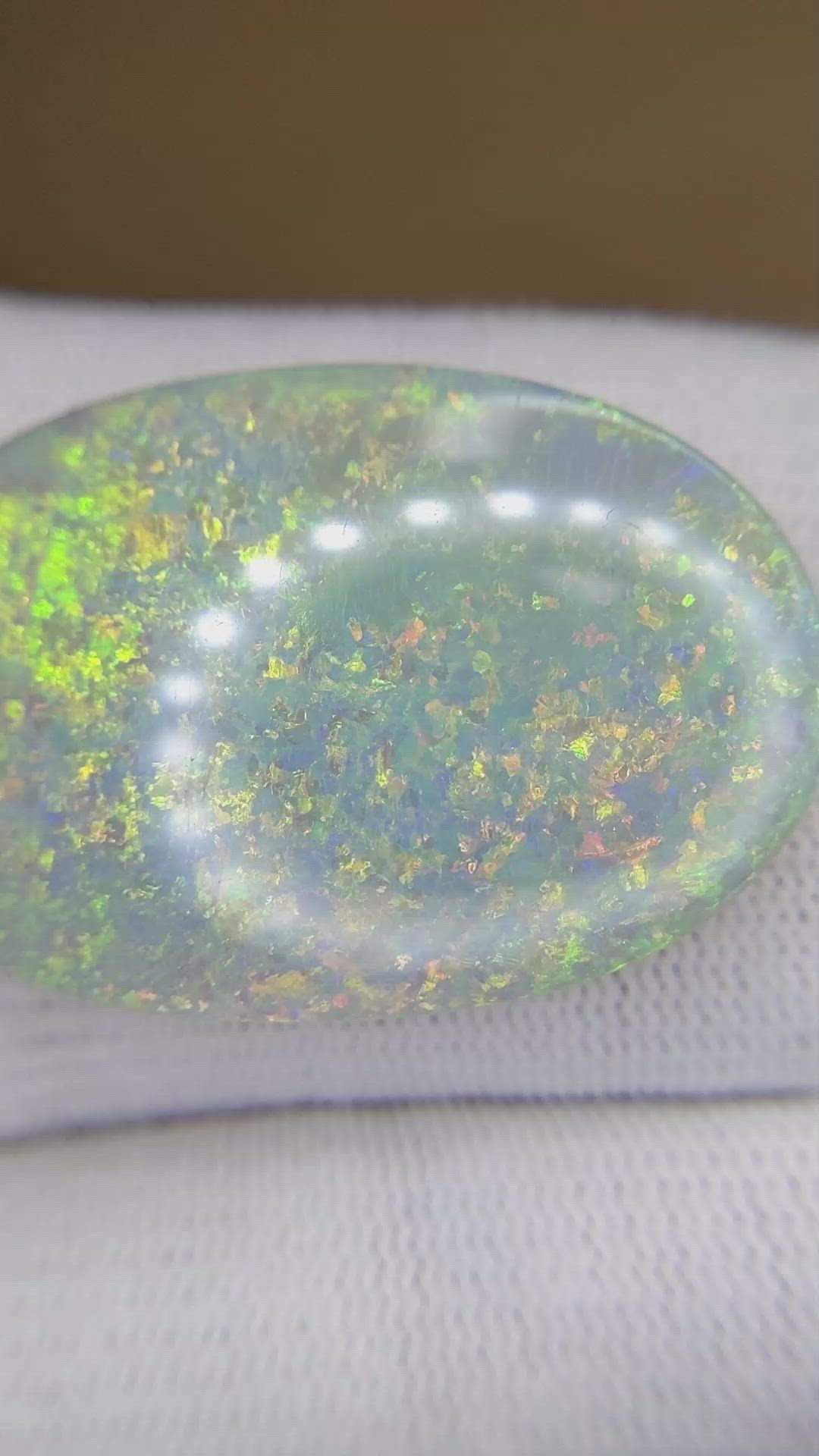 48.40 Ct. Multi Color Cabochon Semi-Black Opal from Australia Size Video
