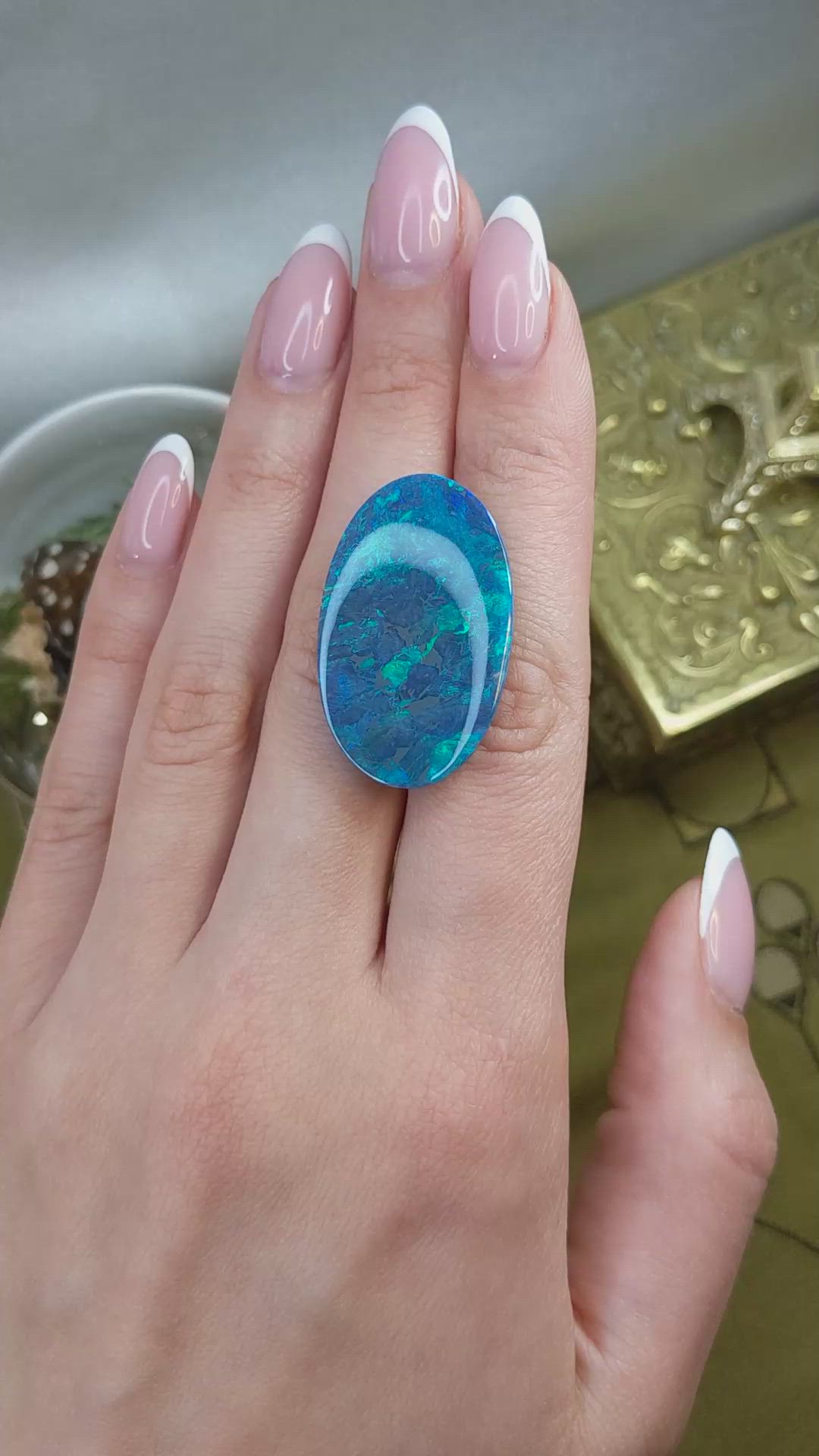 26.57 Ct. Multi Color Cabochon Black Opal from Australia Size Video