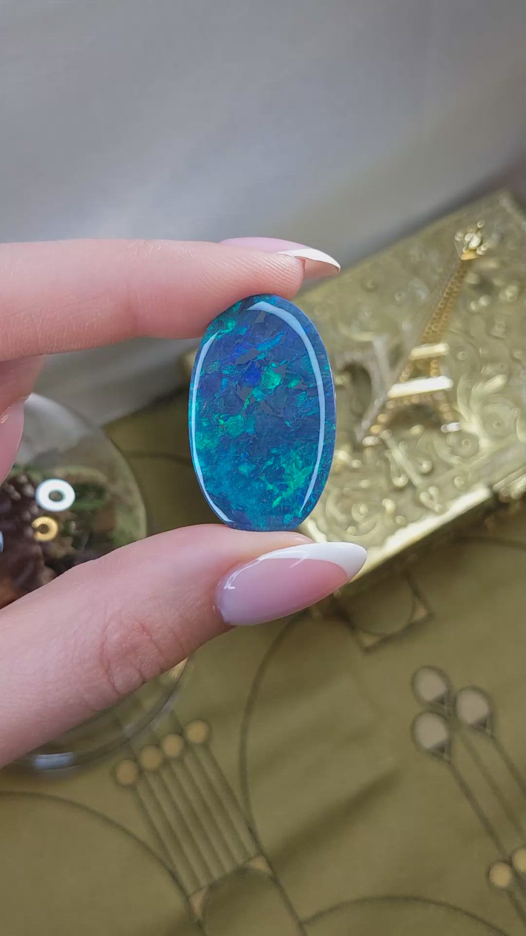 26.57 Ct. Multi Color Cabochon Black Opal from Australia Size Video