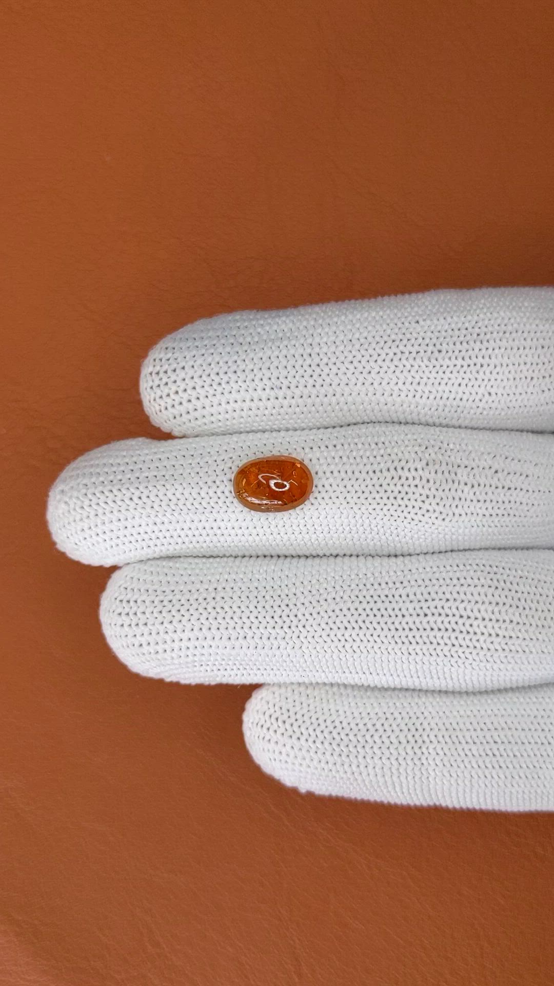 3.44 Ct. Reddish Orange Cabochon Hessonite Garnet from Madagascar Size Video
