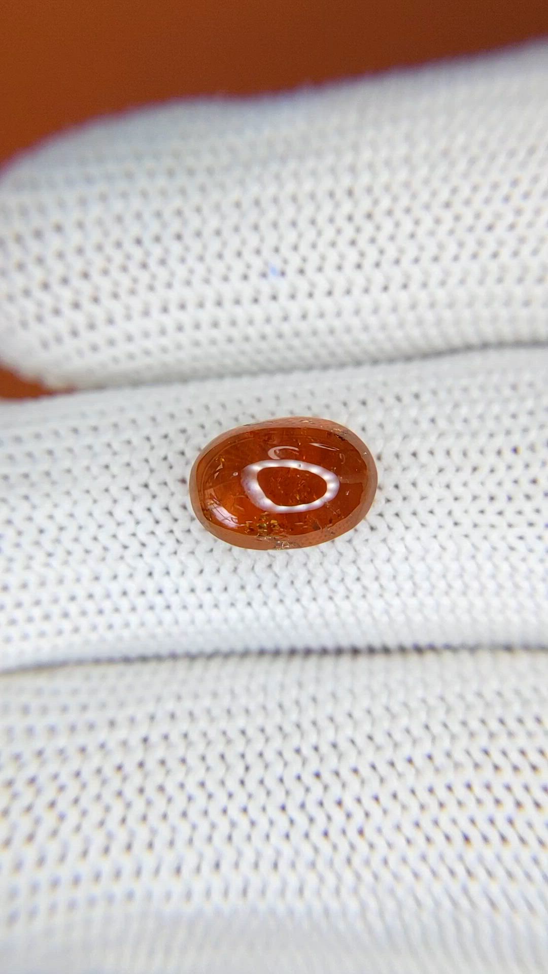 3.44 Ct. Reddish Orange Cabochon Hessonite Garnet from Madagascar Size Video
