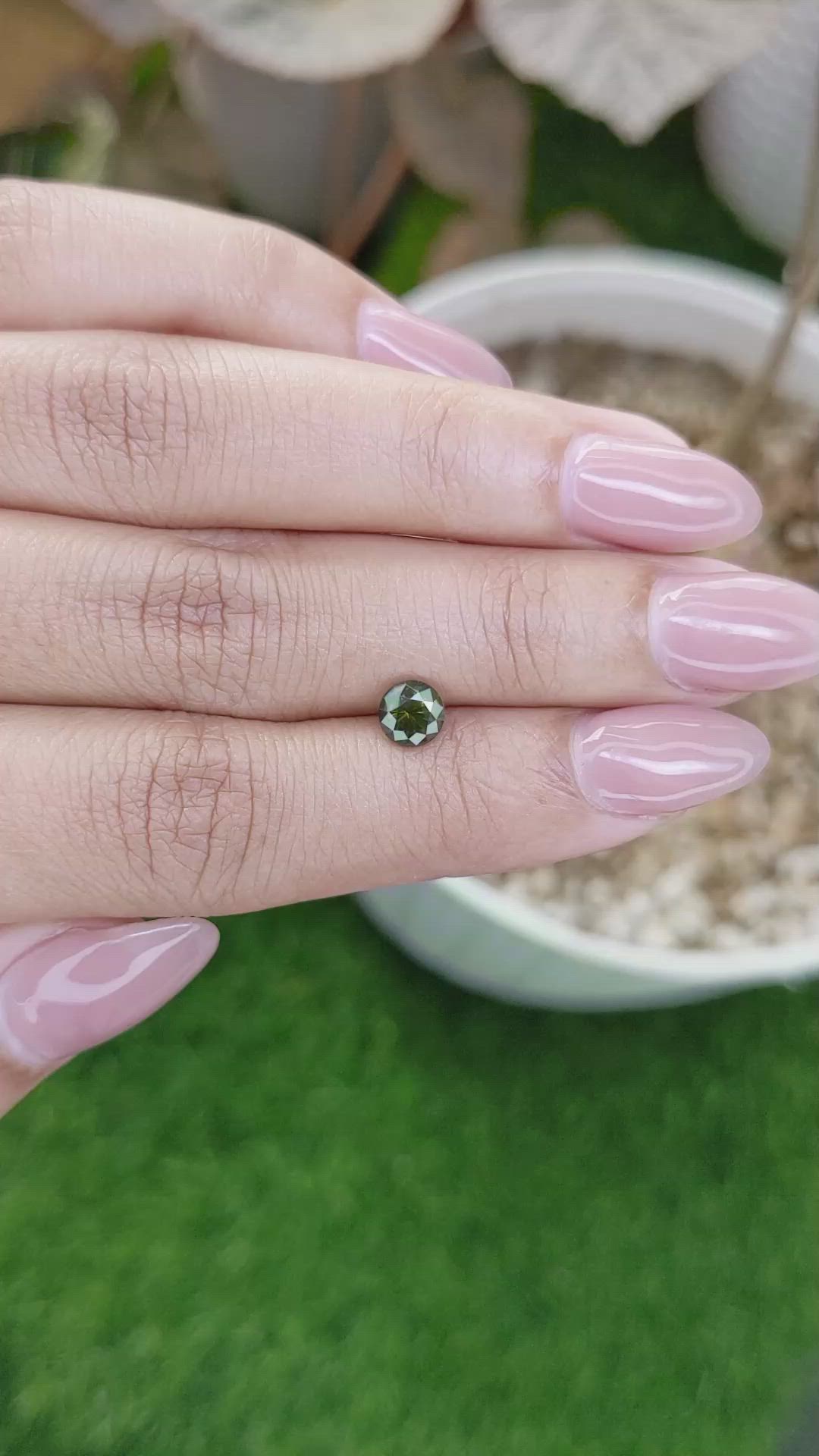 0.97 Ct. Brownish Green Zircon from Ceylon (Sri Lanka) Size Video