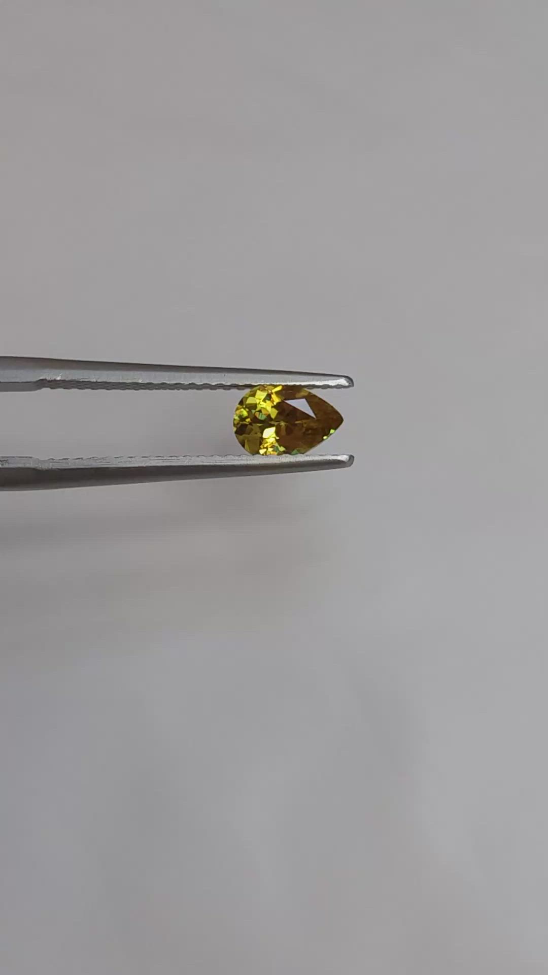 0.61 Ct. Greenish Yellow Sphene (Titanite) from Afghanistan Size Video