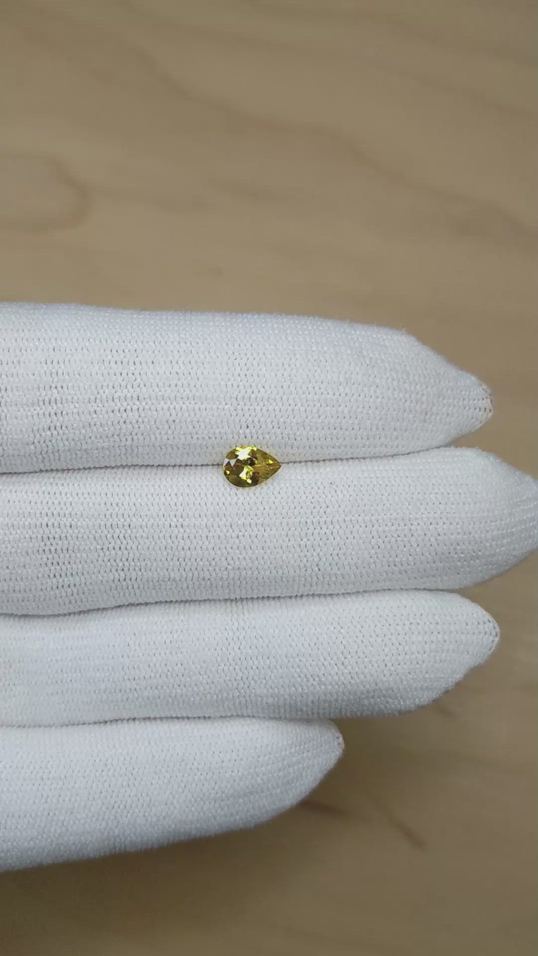 0.61 Ct. Greenish Yellow Sphene (Titanite) from Afghanistan Size Video