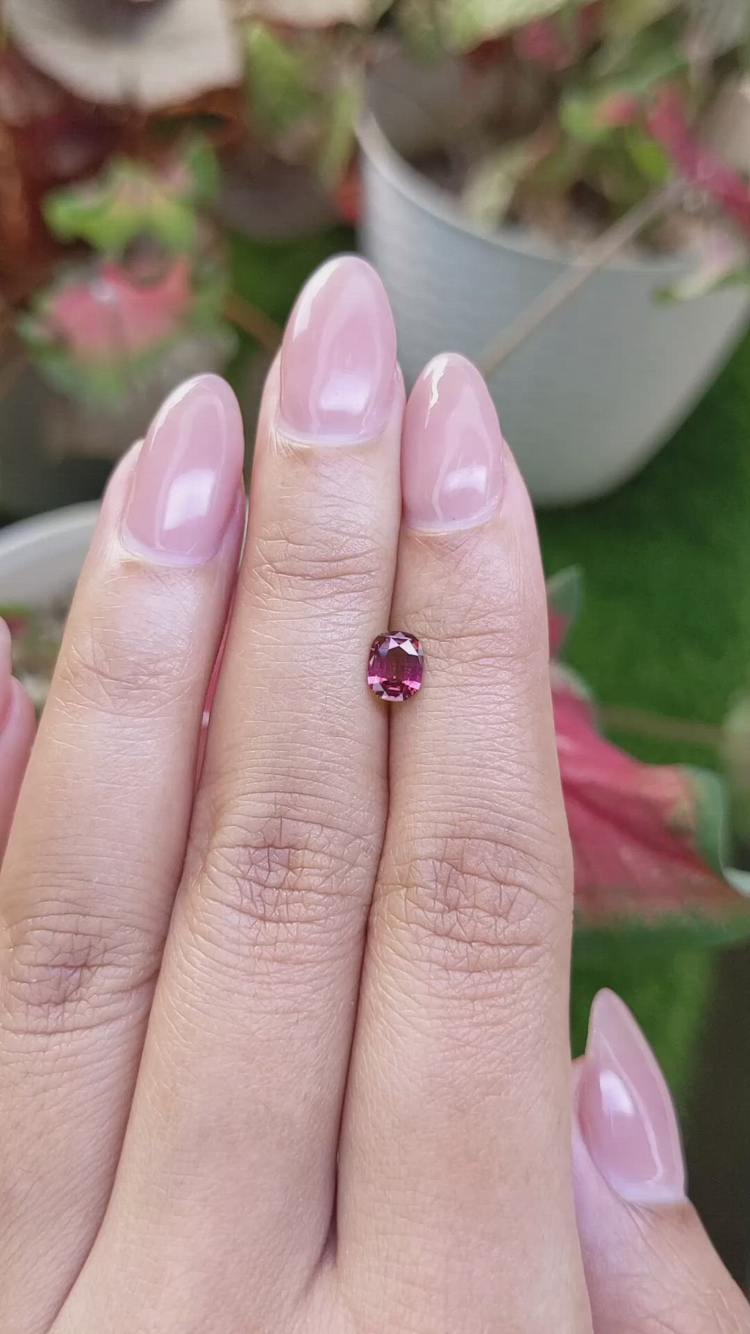 0.60 Ct. Purplish Pink Rhodolite Garnet from Ceylon (Sri Lanka) Size Video
