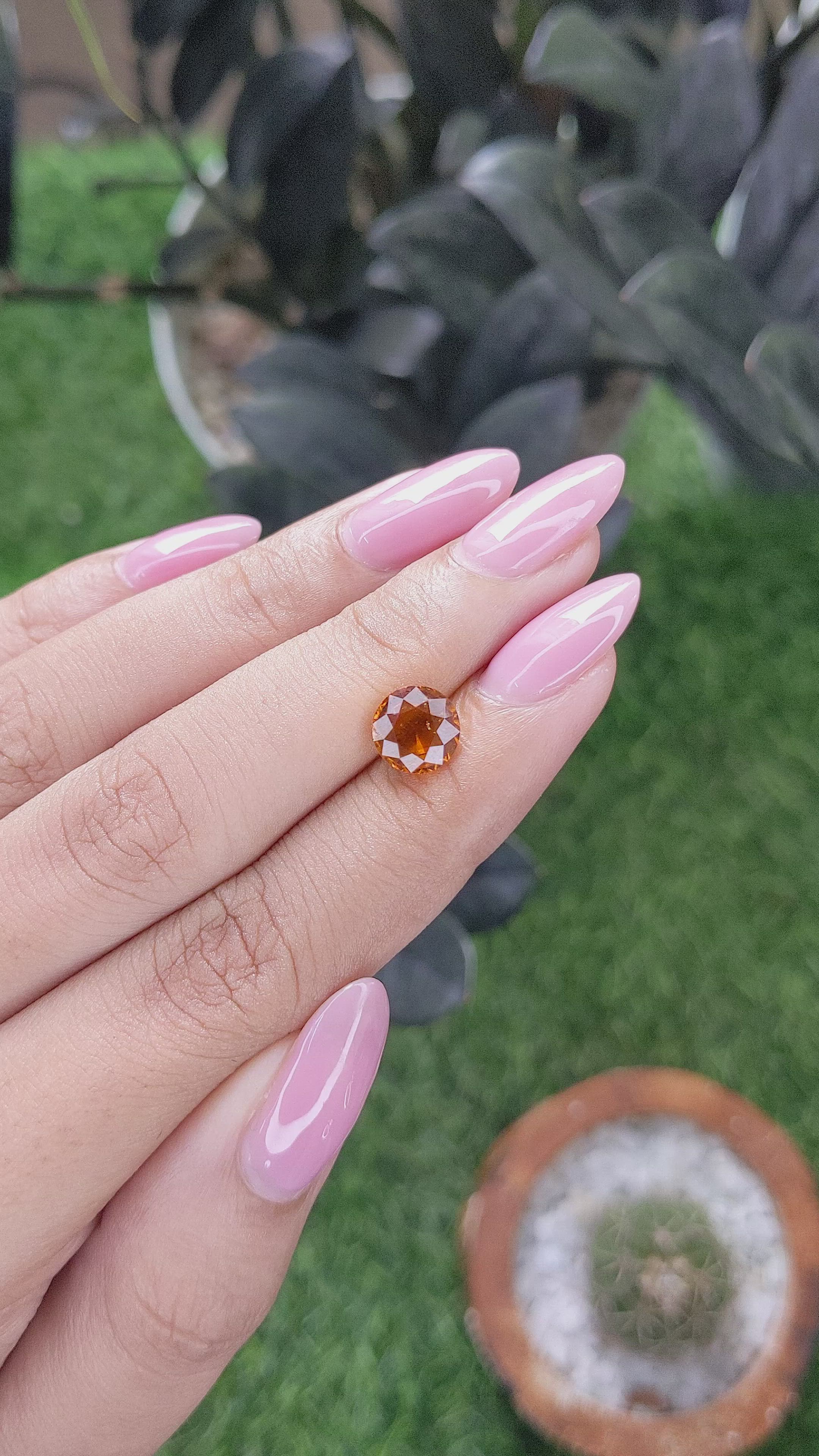 1.87 Ct. Orange Hessonite Garnet Size Video